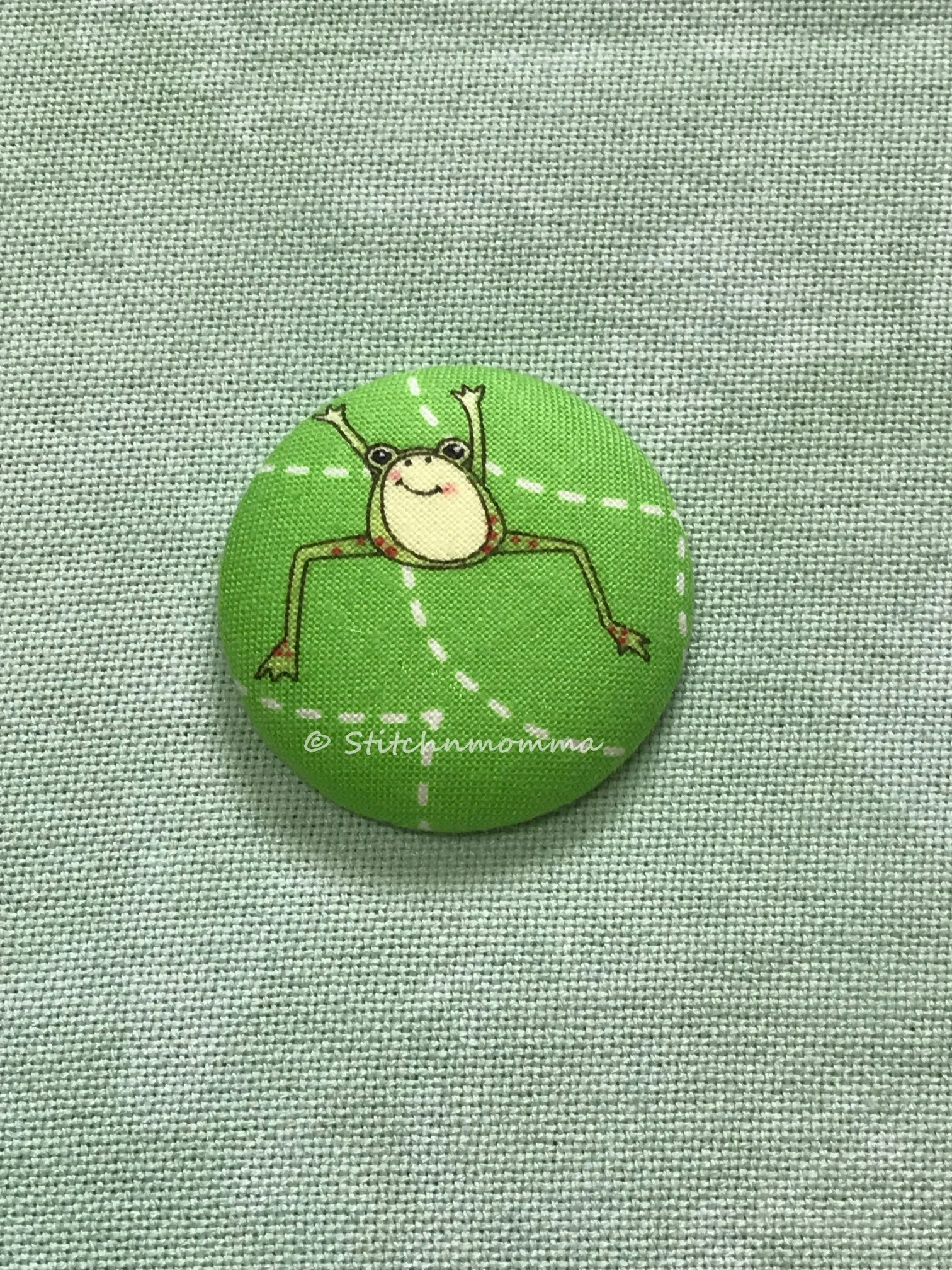 Needle Minder - Jumping Frog on fabric.jpg