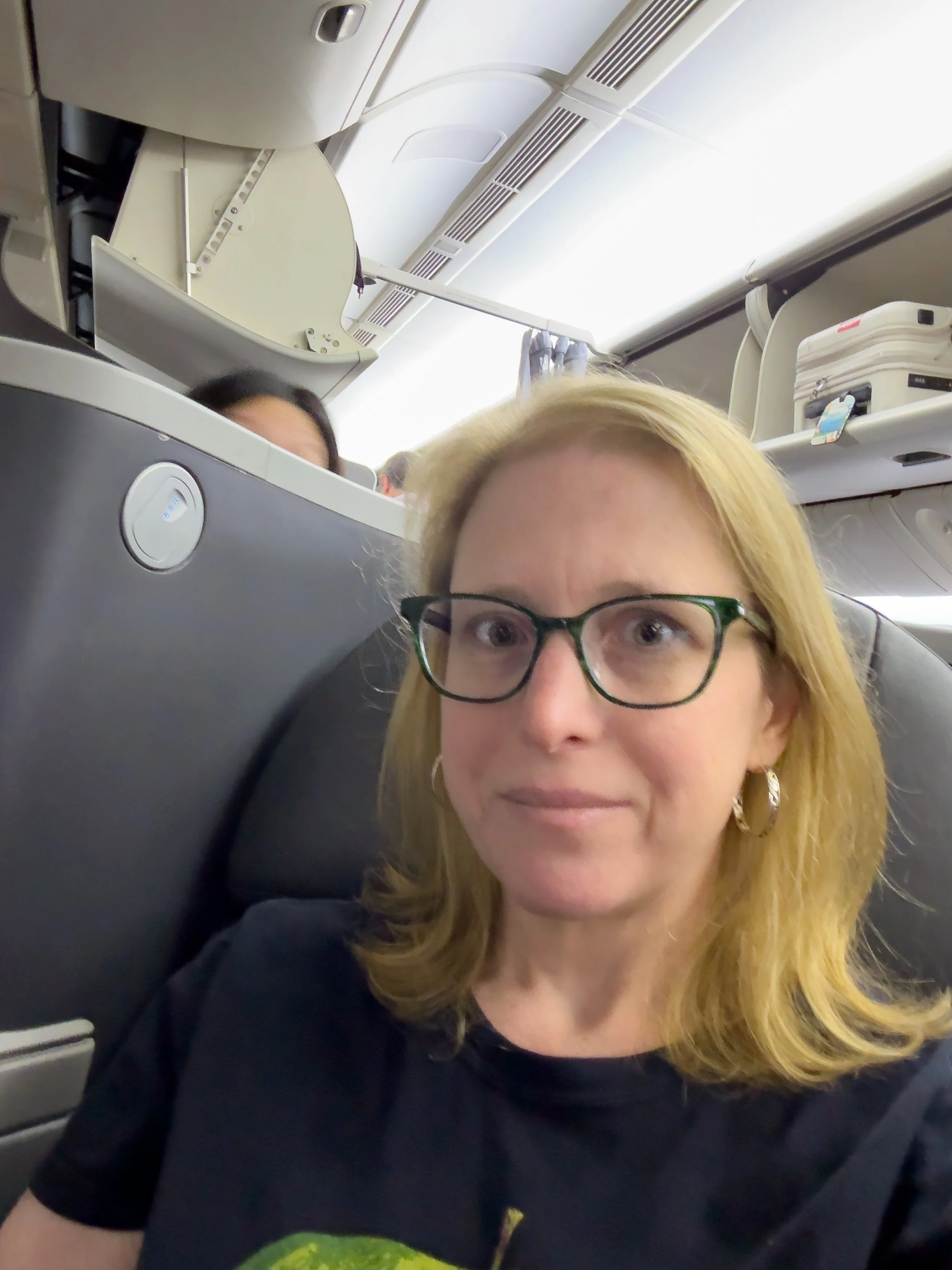 Settled in for my flight with a randomly good hair day