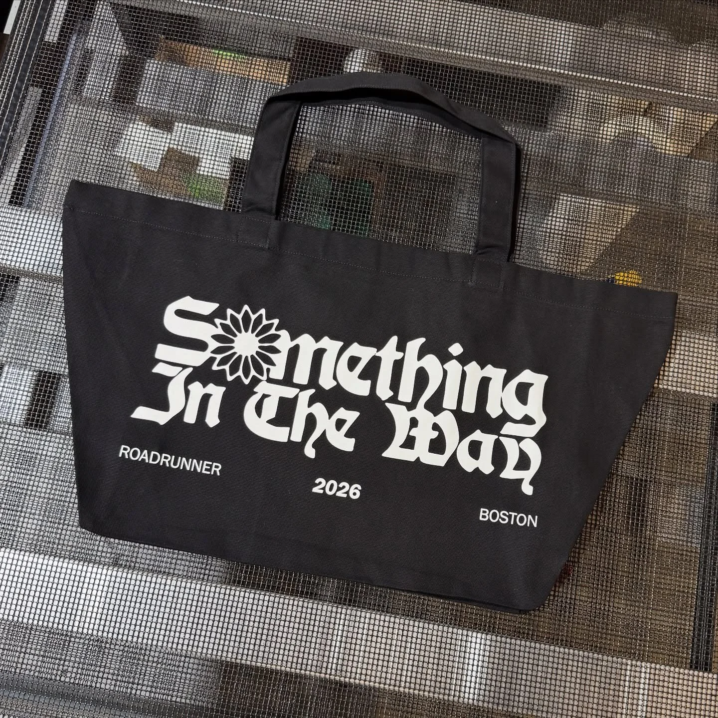 Merch spread for @runforcover @somethinginthewayfest 2026. Printed and embroidered on @ascolour