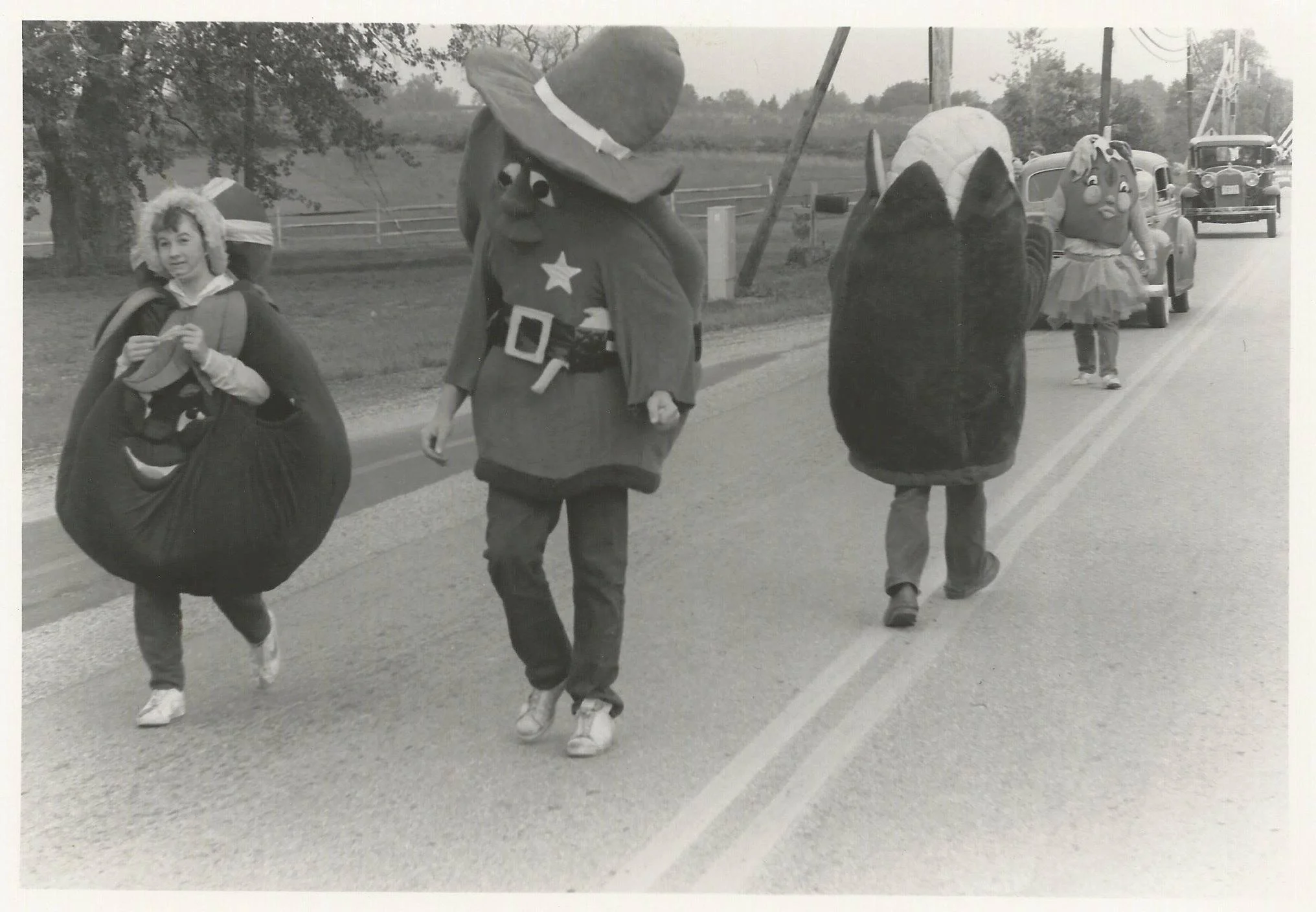 Mr Spud, King Apple, Cornelius Corn, and Toto Tomato in the parade.jpg