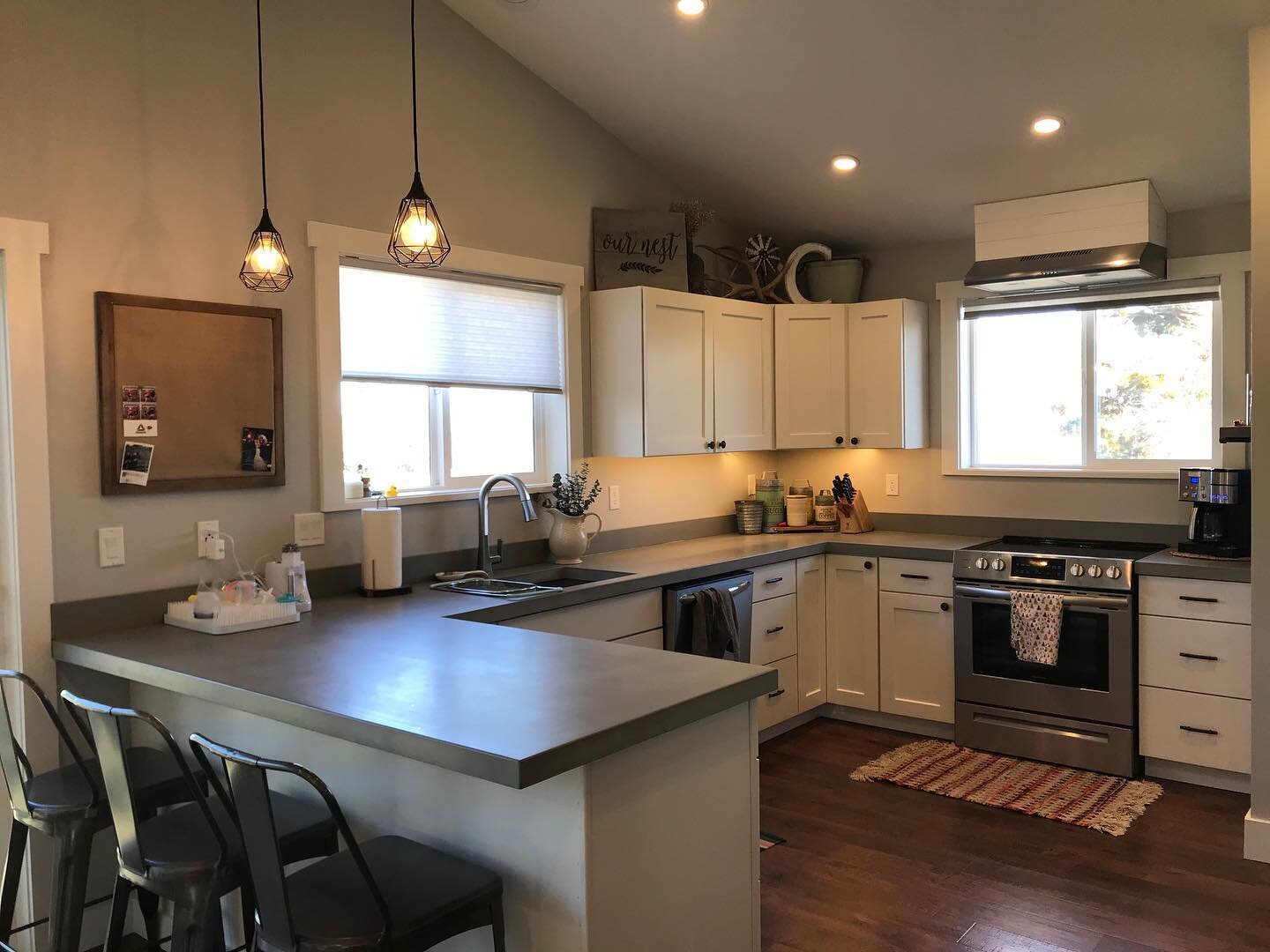 Full kitchen + Backsplash we did a little over a year ago, and still looking amazing! This whole kitchen was done in only two pieces, leaving a completely seamless finish.