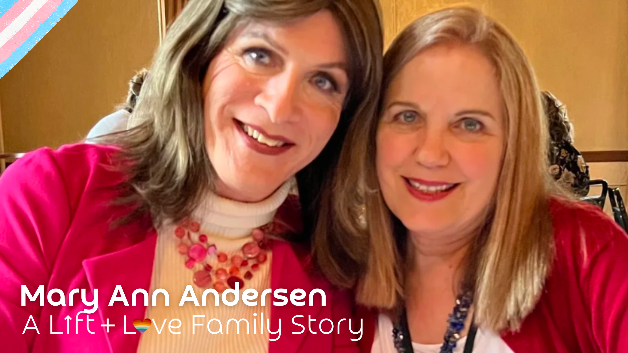 Two women smiling for a photo at a family gathering, with a warm, wooden background. One is wearing a pink jacket and a pink beaded necklace, the other in a red top and a patterned necklace. Text overlay reads: 'Mary Ann Andersen, A Lift + Love Family Story'.