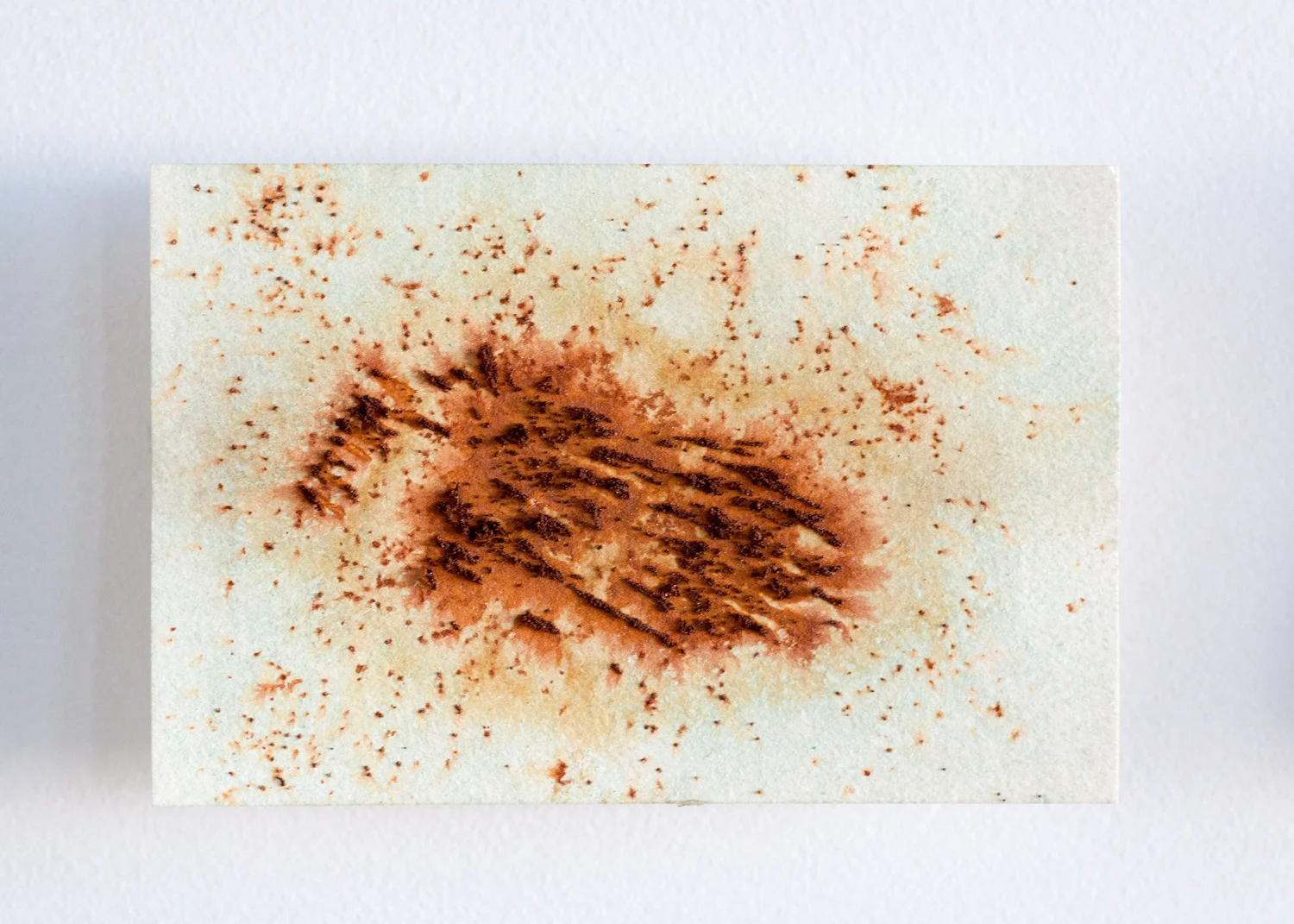   SDY-MF Repel , 2017. Rust and corrosion on paper. 4” x 6” 