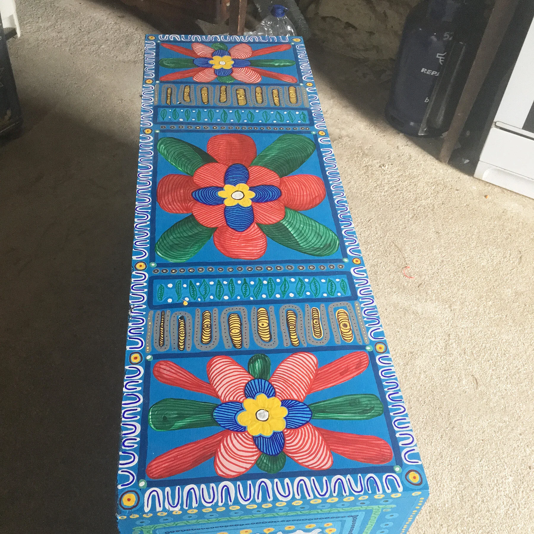 Detail of hand-painted wooden furniture by Taylor Meagher