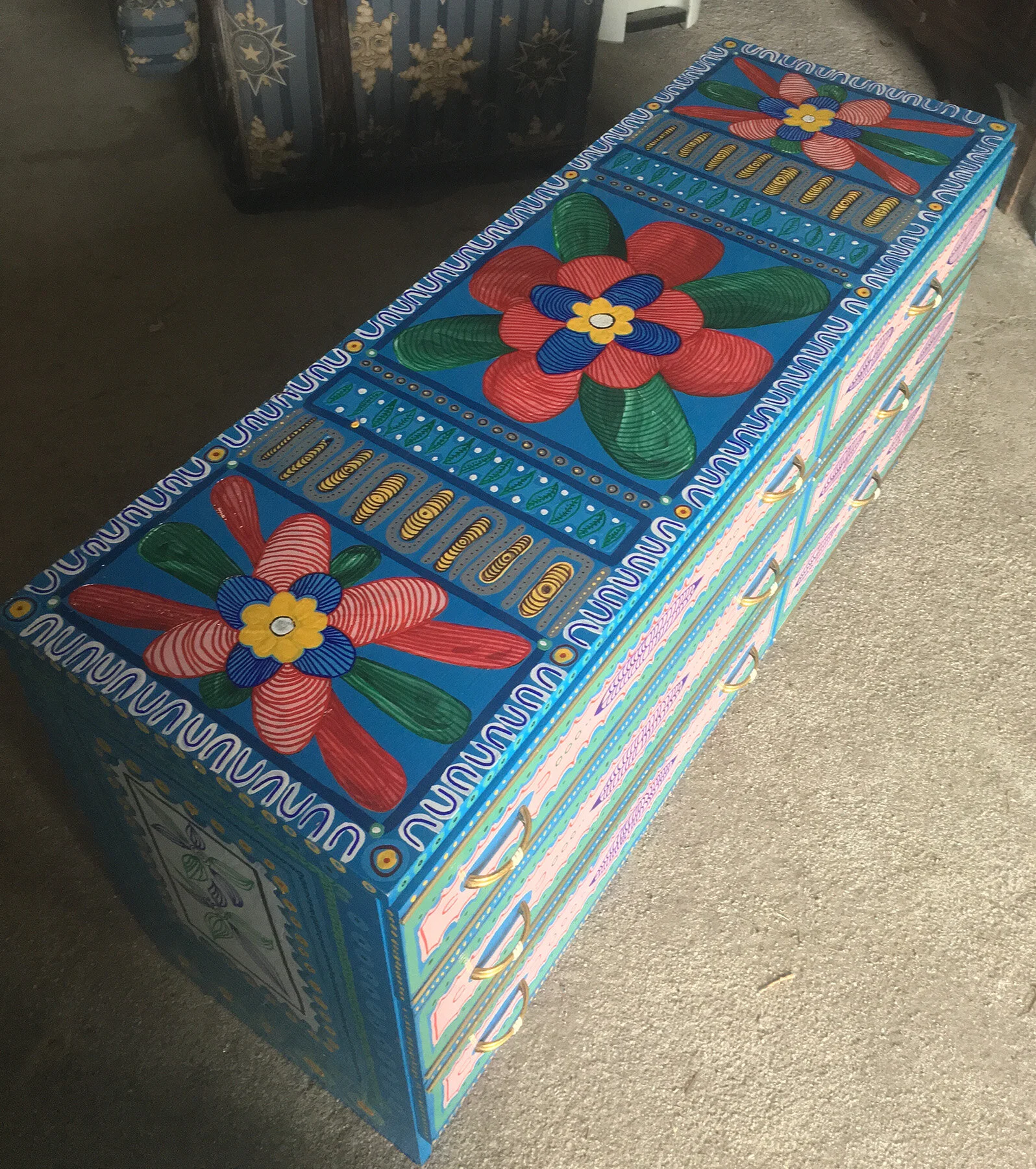 Painted wooden furniture artwork by Taylor Meagher