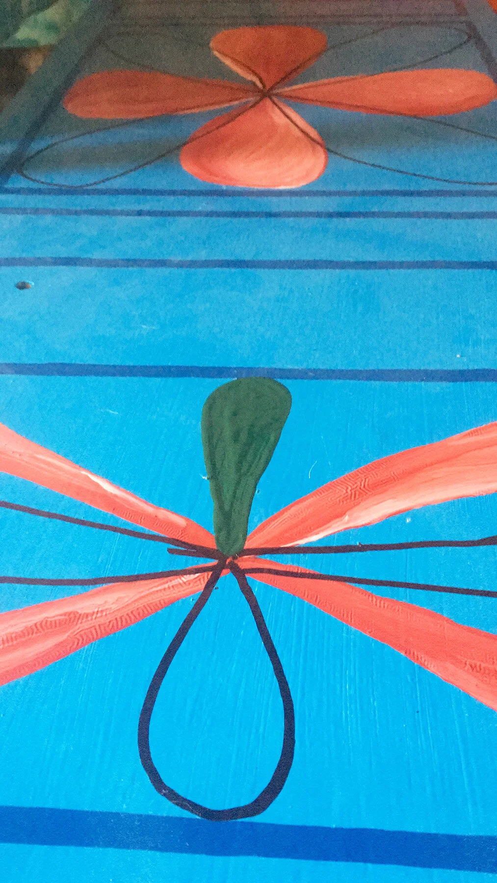 Close-up of painted furniture artwork by Taylor Meagher