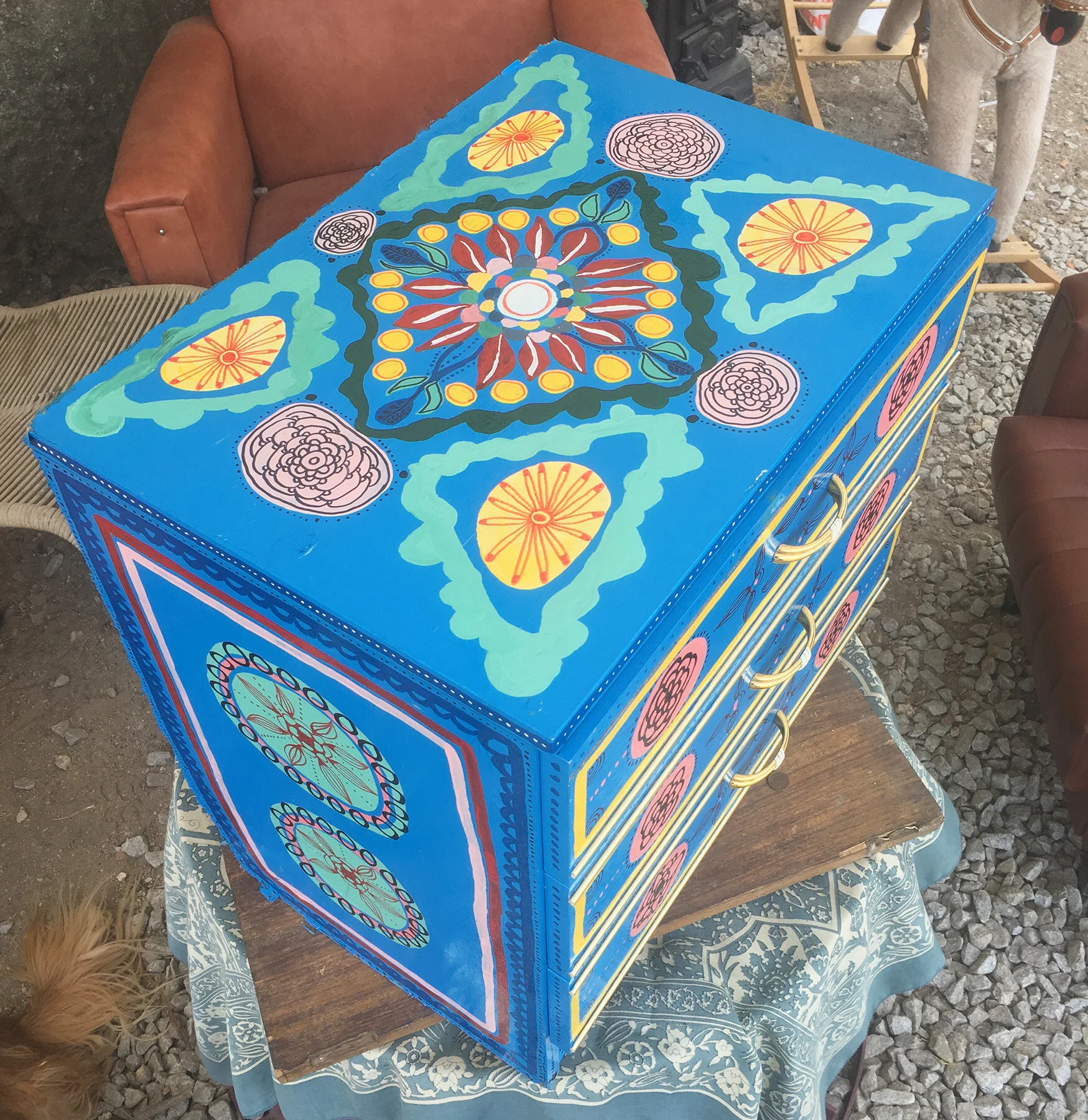 Hand-painted wooden furniture artwork by Taylor Meagher