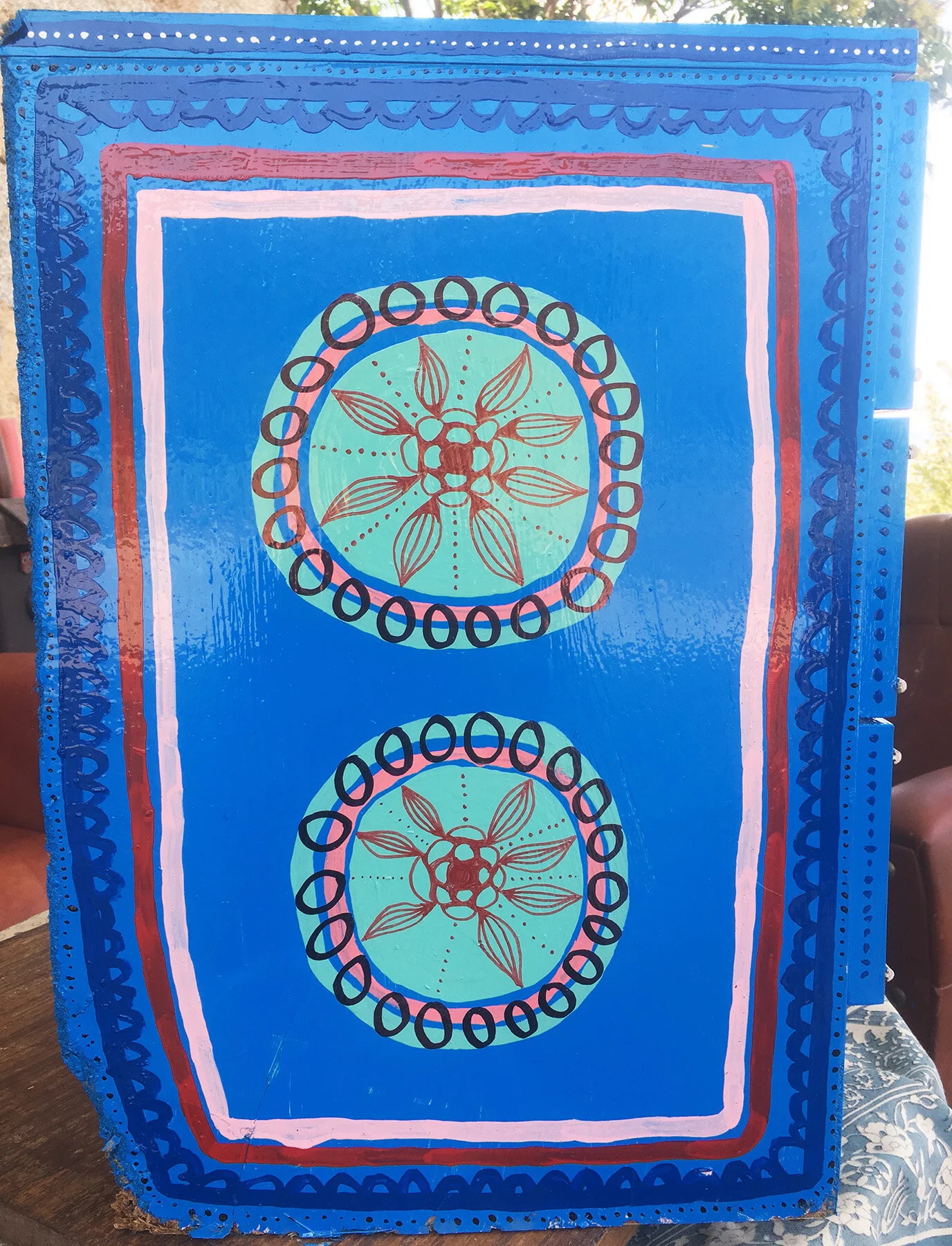 Hand-painted wooden furniture artwork by Taylor Meagher