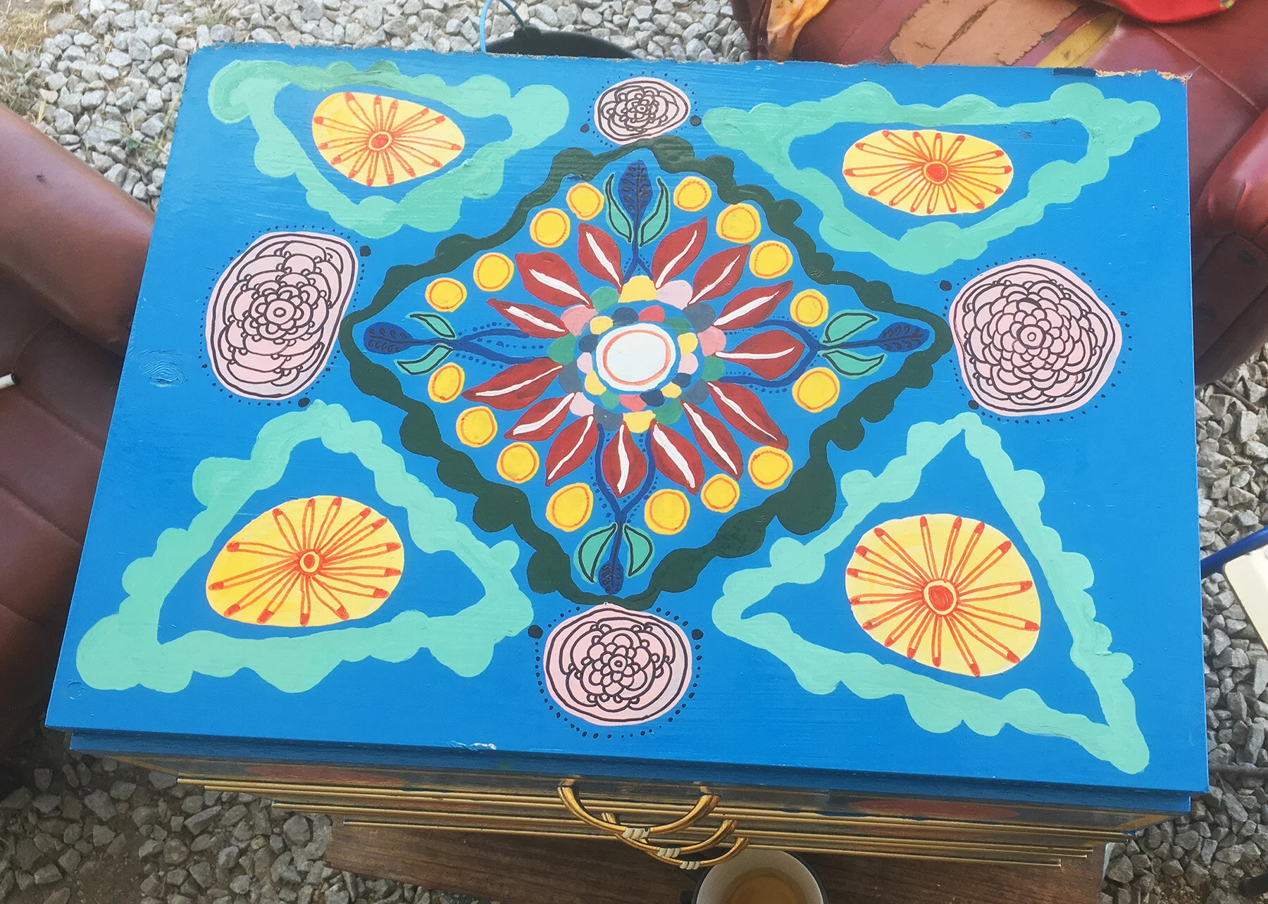 Close-up of painted furniture artwork by Taylor Meagher