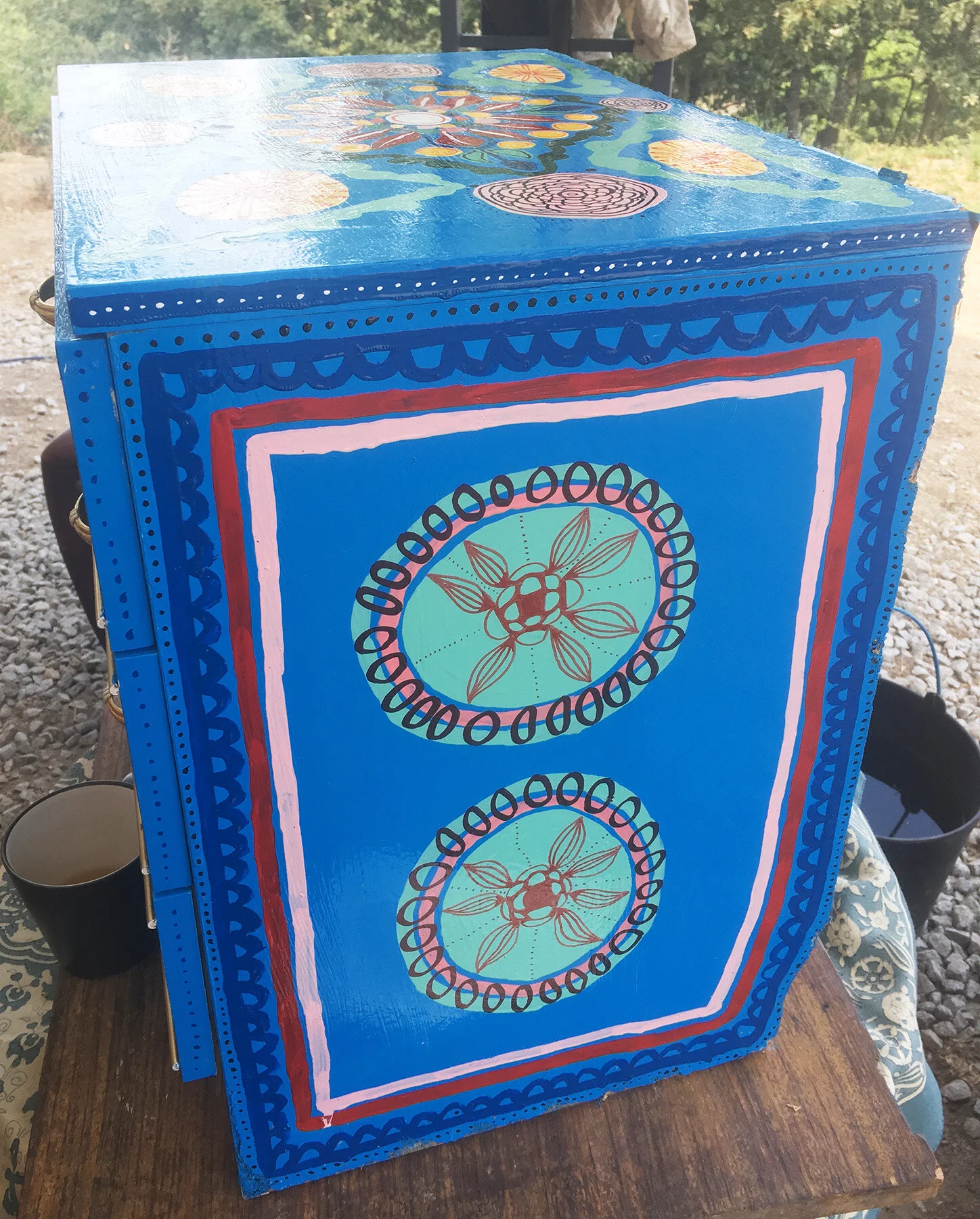 Close-up of painted furniture artwork by Taylor Meagher
