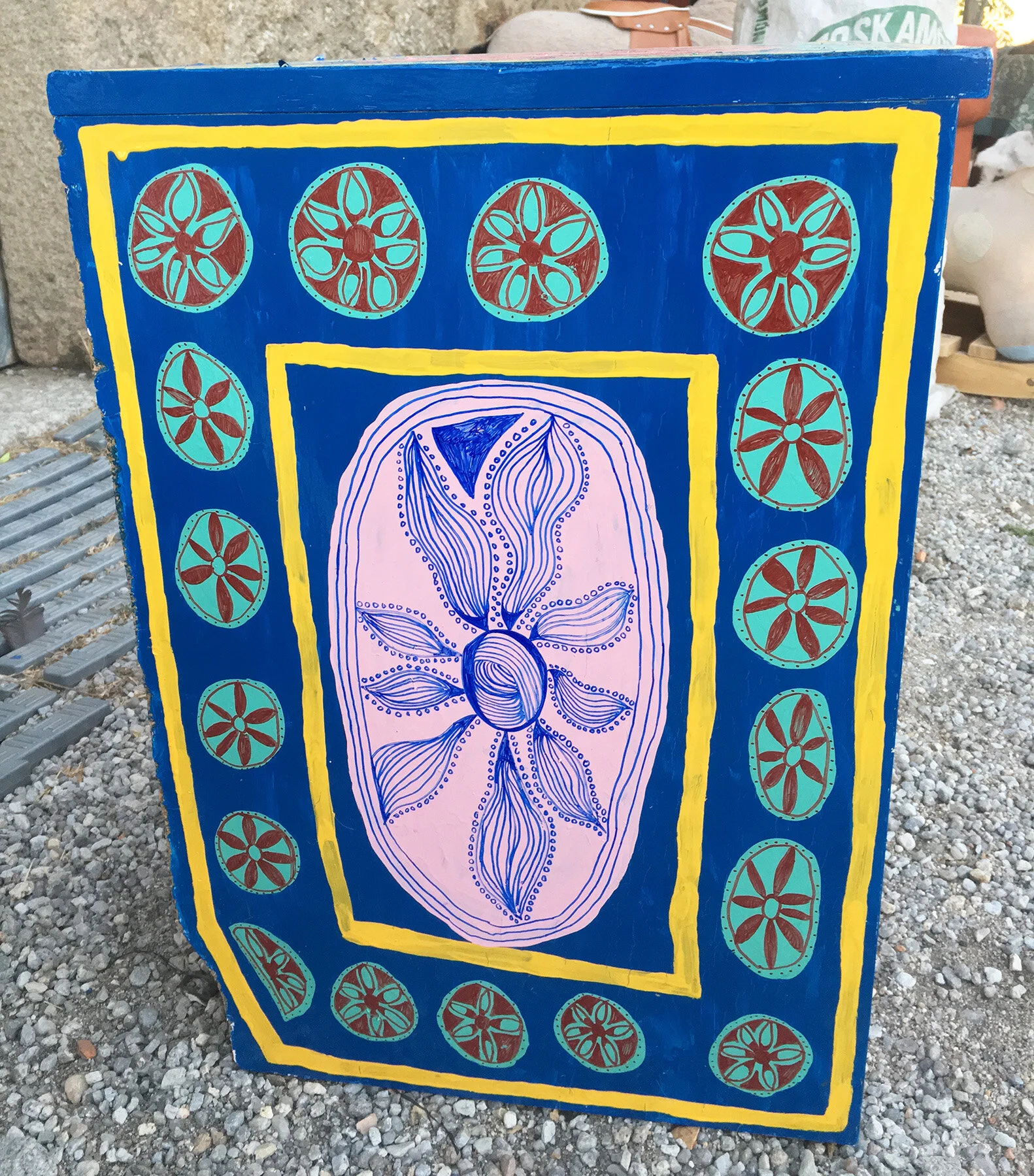 Close-up of painted furniture artwork by Taylor Meagher