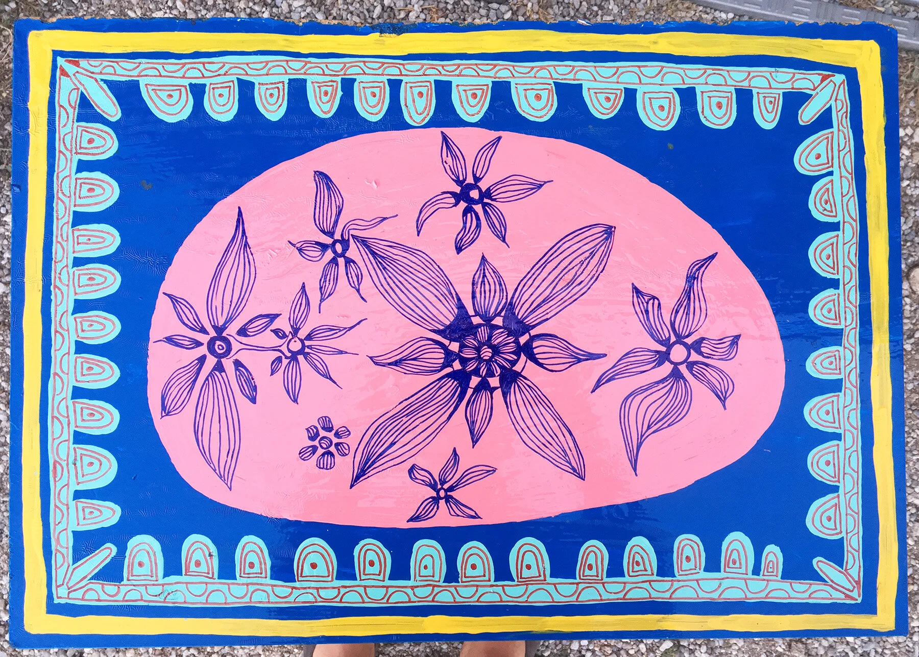 Close-up of painted furniture artwork by Taylor Meagher