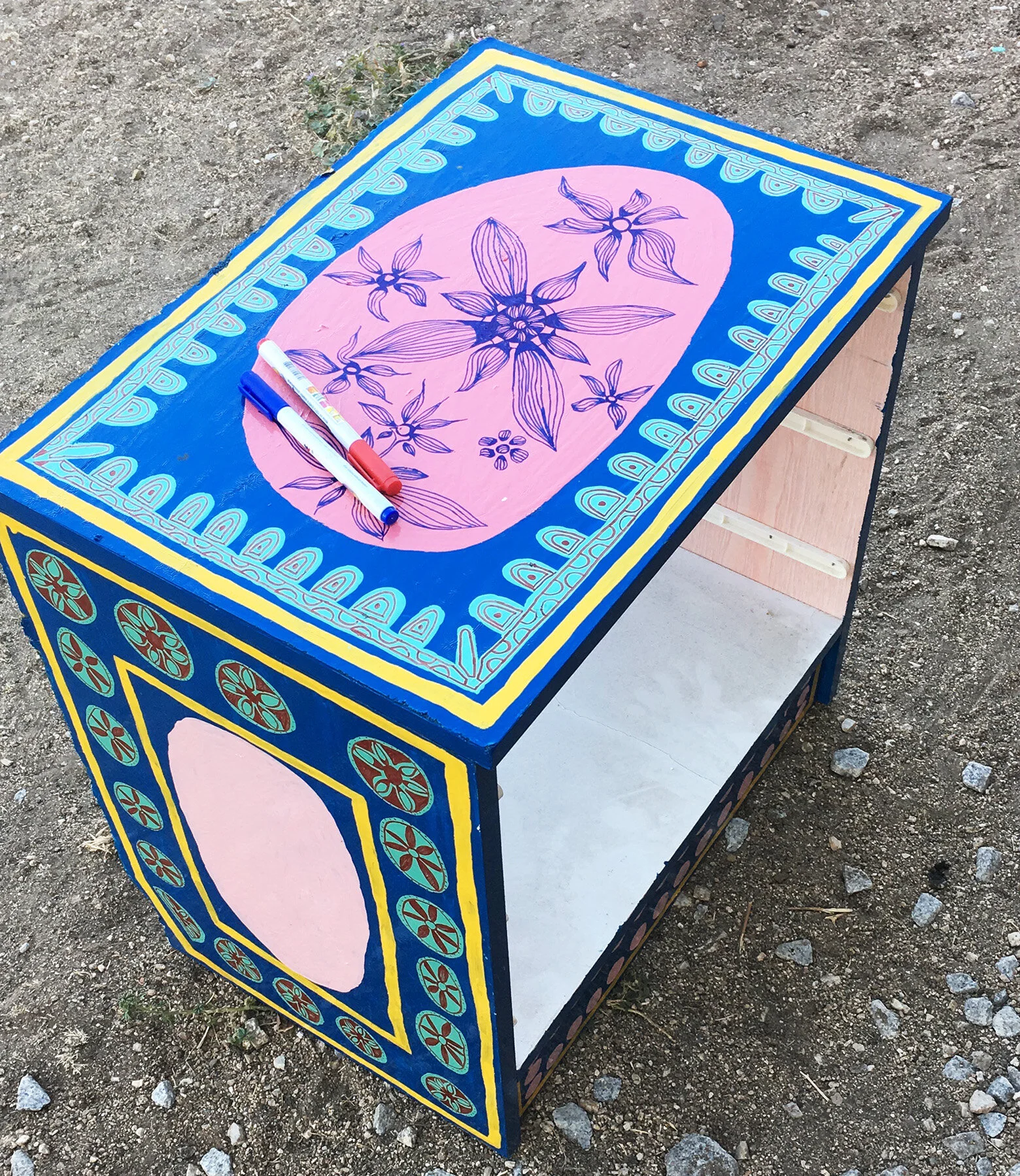 Close-up of painted furniture artwork by Taylor Meagher