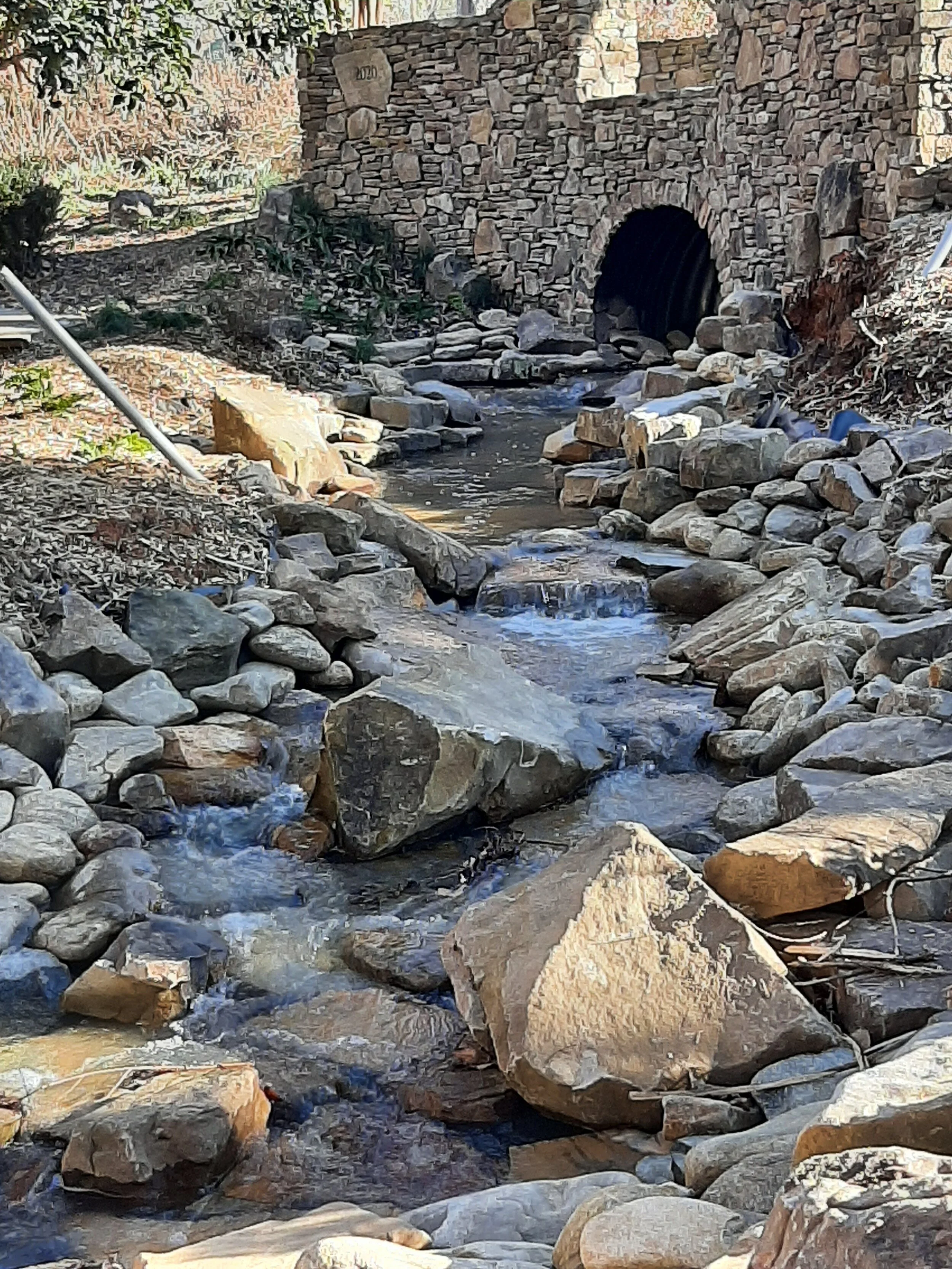 Work on the Creek Bed in the Children's Garden is Completed