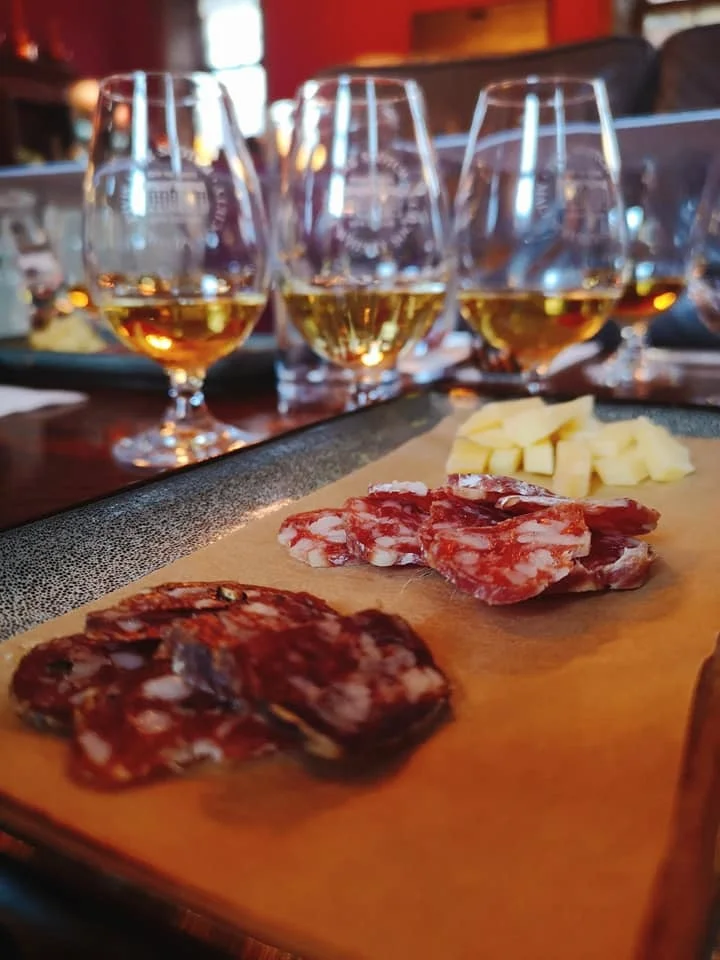 charcuterie board and whiskies.jpg