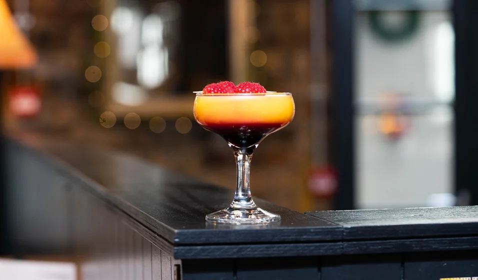 ABSOLUT SHAMBLES : Absolut Vodka, Chambord, Apple Juice, Passion Fruit Syrup and Lemon Juice