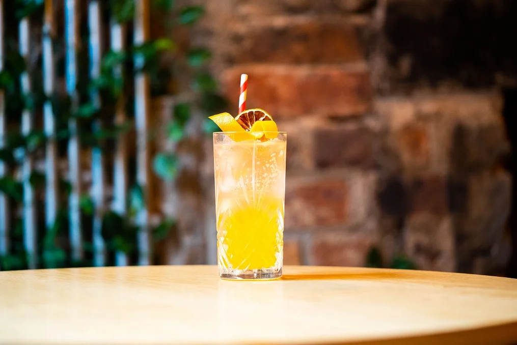 SWEDISH HOME, SCOTTISH HEART : Absolut Vodka, Absolut Mango Vodka, Lemon Juice, IRN-BRU Reduction, Rubicon Mango Juice and Peach Bitters, topped with Soda Water