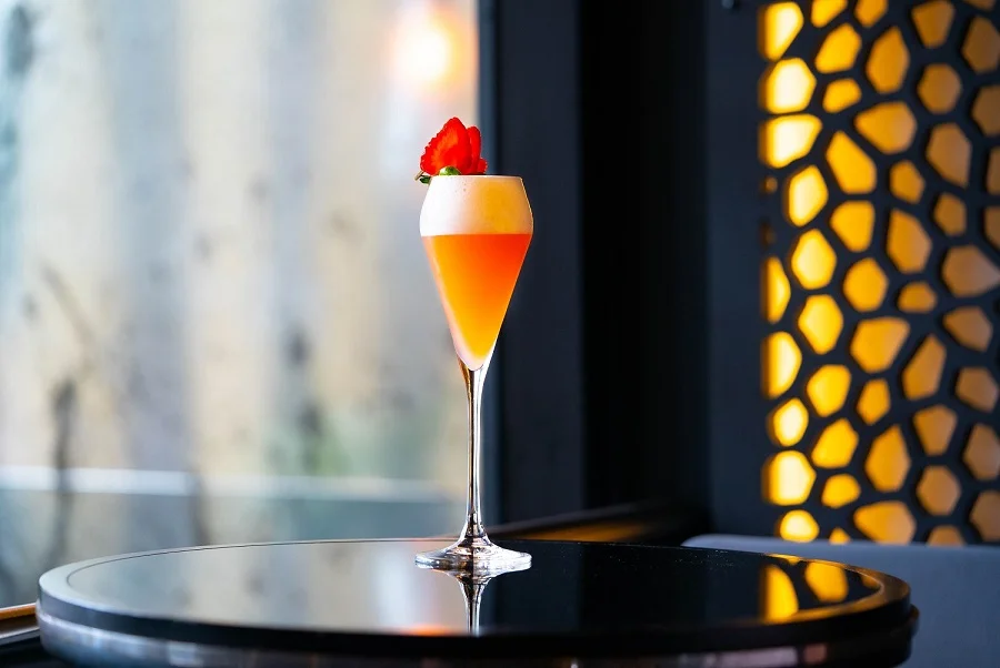 GAUCHO SUNRISE : Pink Gin, Amaretto, Lemon Juice and Homemade Strawberry Syrup