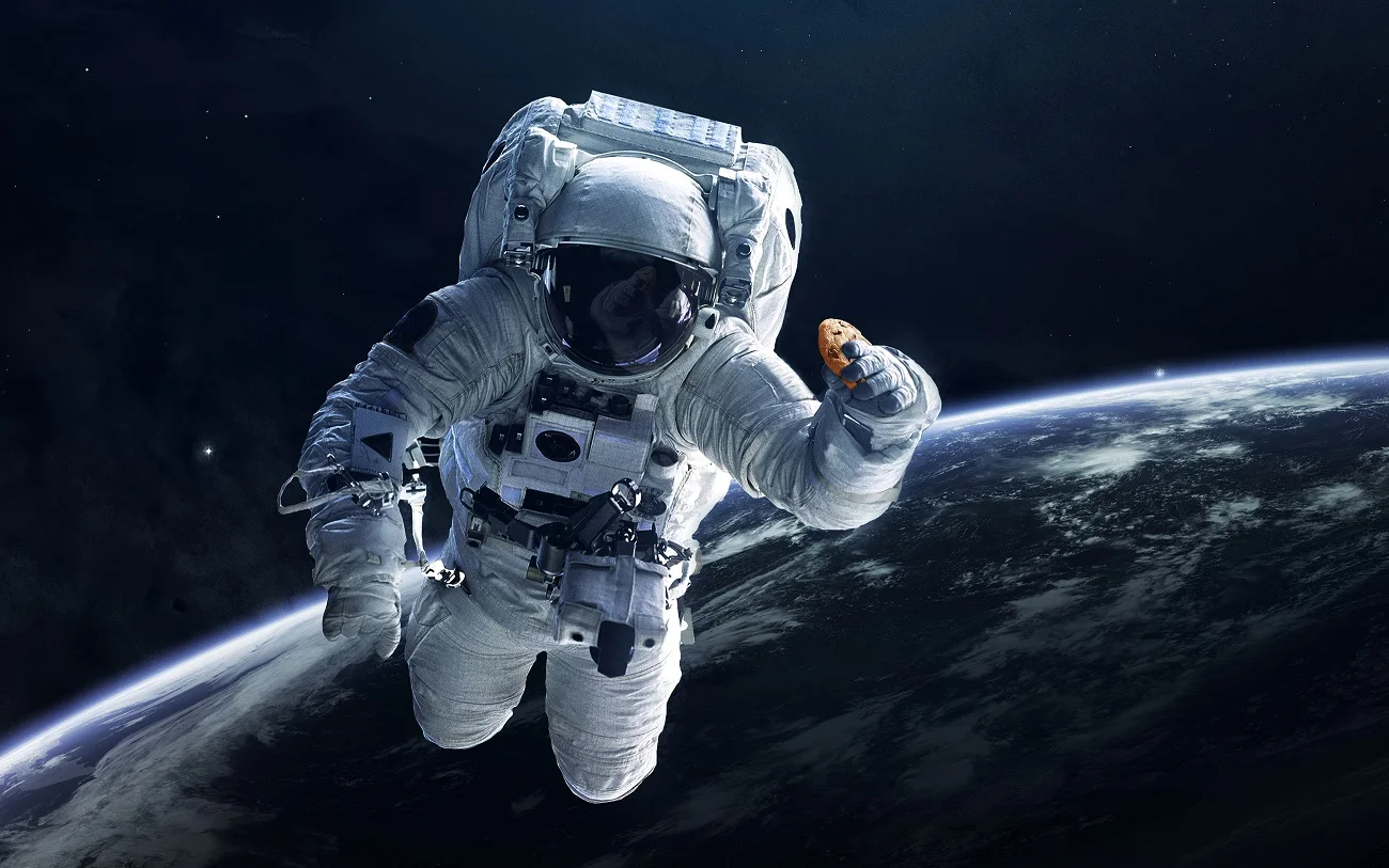 Astronaut Holding DoubleTree Cookie.jpg