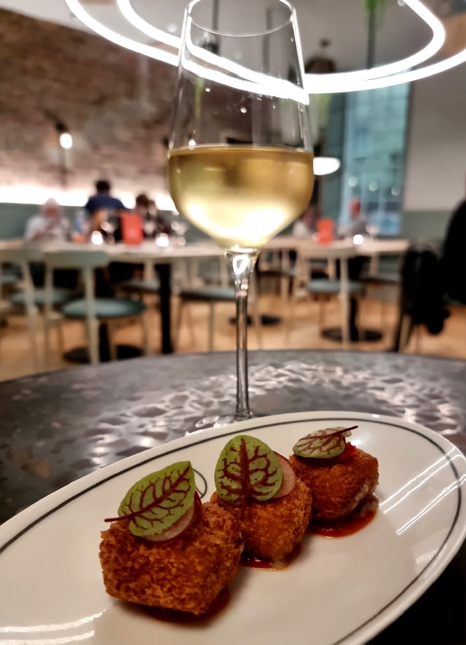 black grape croquettas with wine.jpg