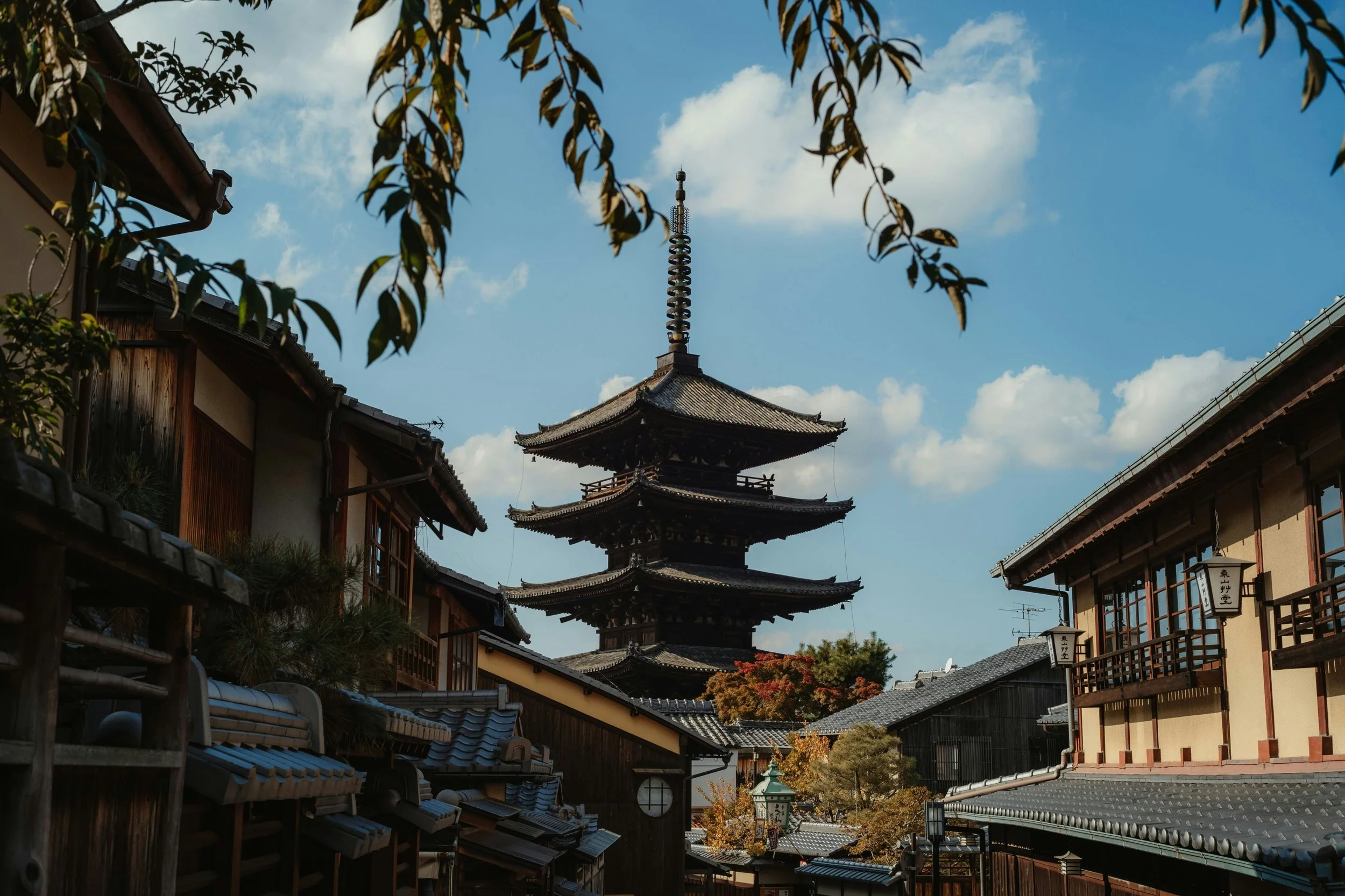 https://unsplash.com/photos/traditional-japanese-pagoda-surrounded-by-houses-bd_sGmfIKQU