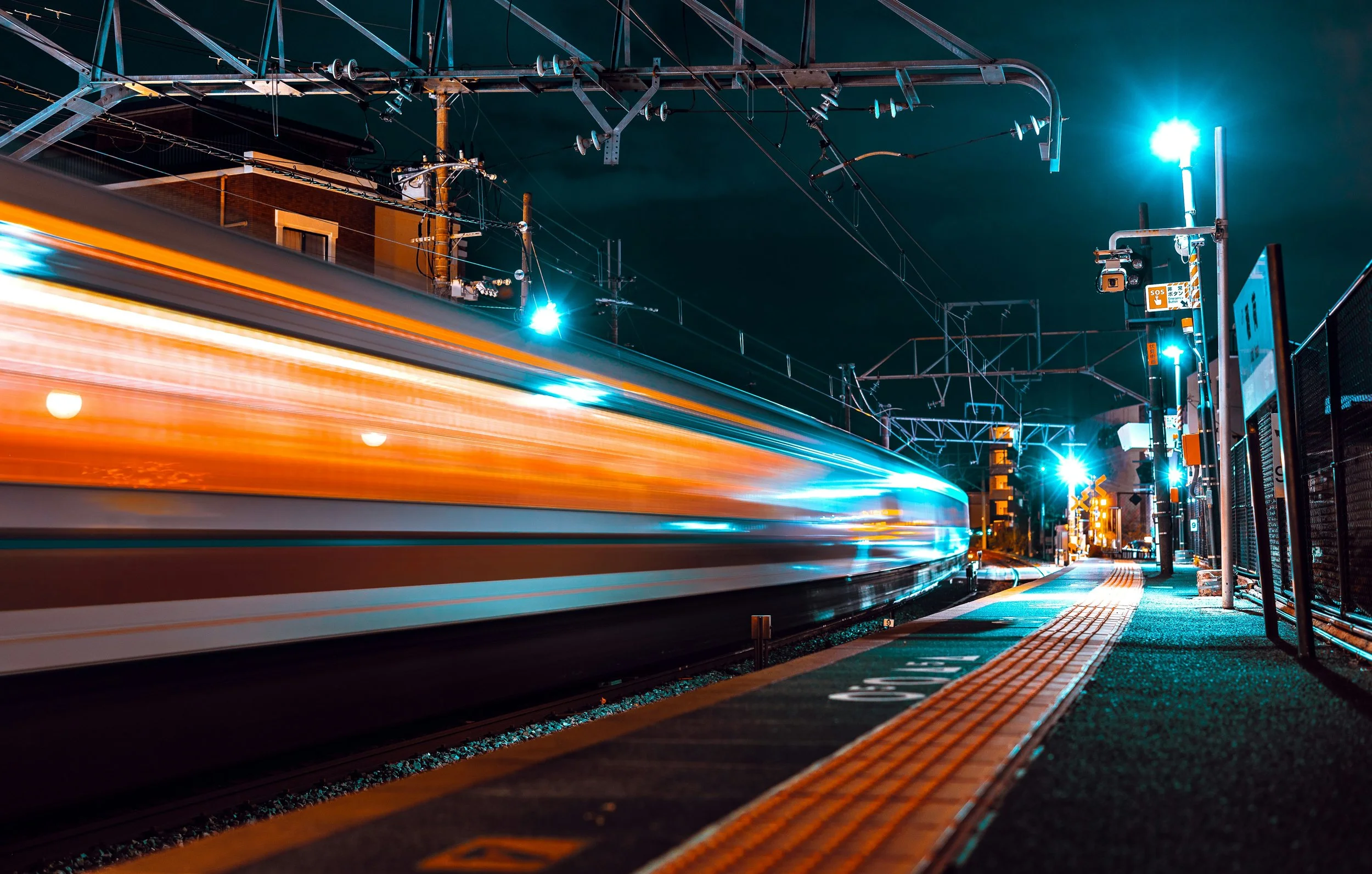 https://unsplash.com/photos/a-train-speeds-through-a-station-at-night-wan3oOH6wCA?utm_source=unsplash&amp;utm_medium=referral&amp;utm_content=creditShareLink