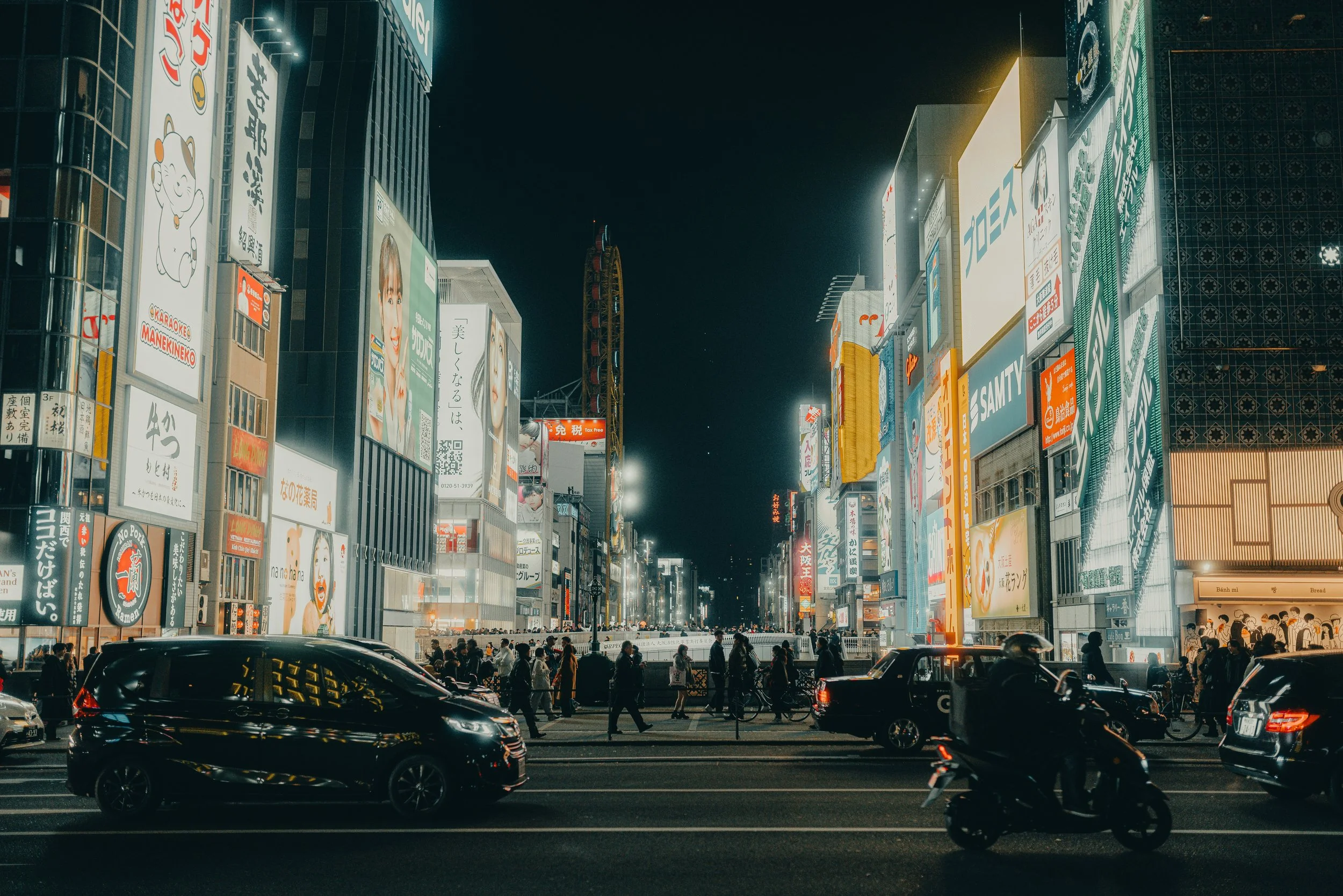 https://unsplash.com/photos/busy-city-street-at-night-with-glowing-signs-U0RUVTTb0TM?utm_source=unsplash&amp;utm_medium=referral&amp;utm_content=creditShareLink