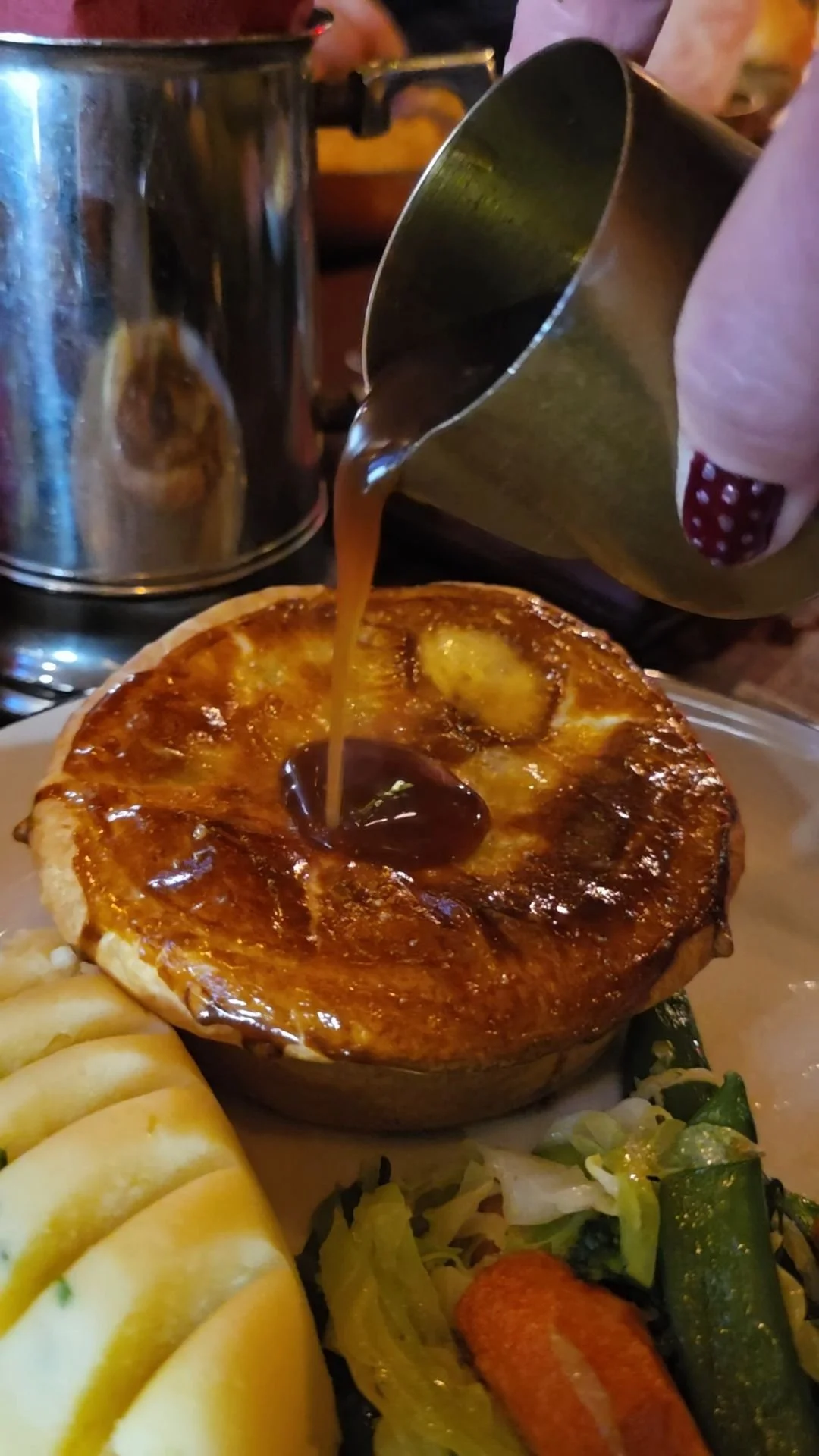 queens arms pie gravy pour.jpg