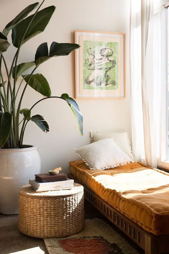 Cosy room article. Image of plants next to a day bed.jpg