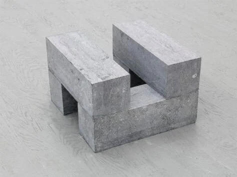 One of Carl Andre’s pieces, made out of commercial blocks