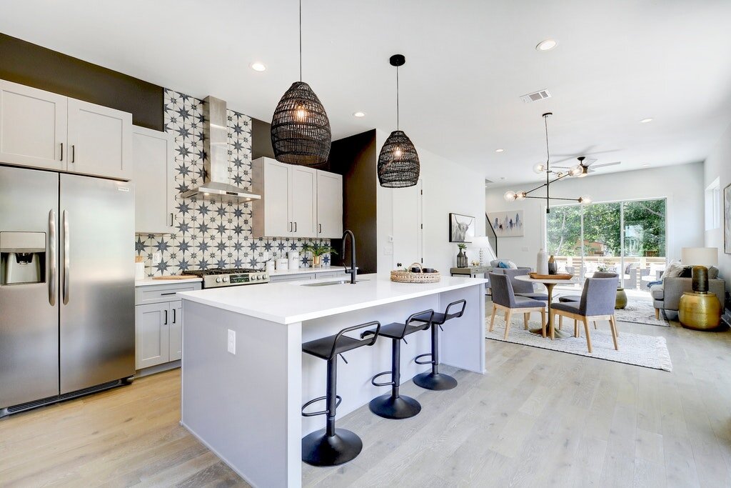 Kitchen open to dining area and living room