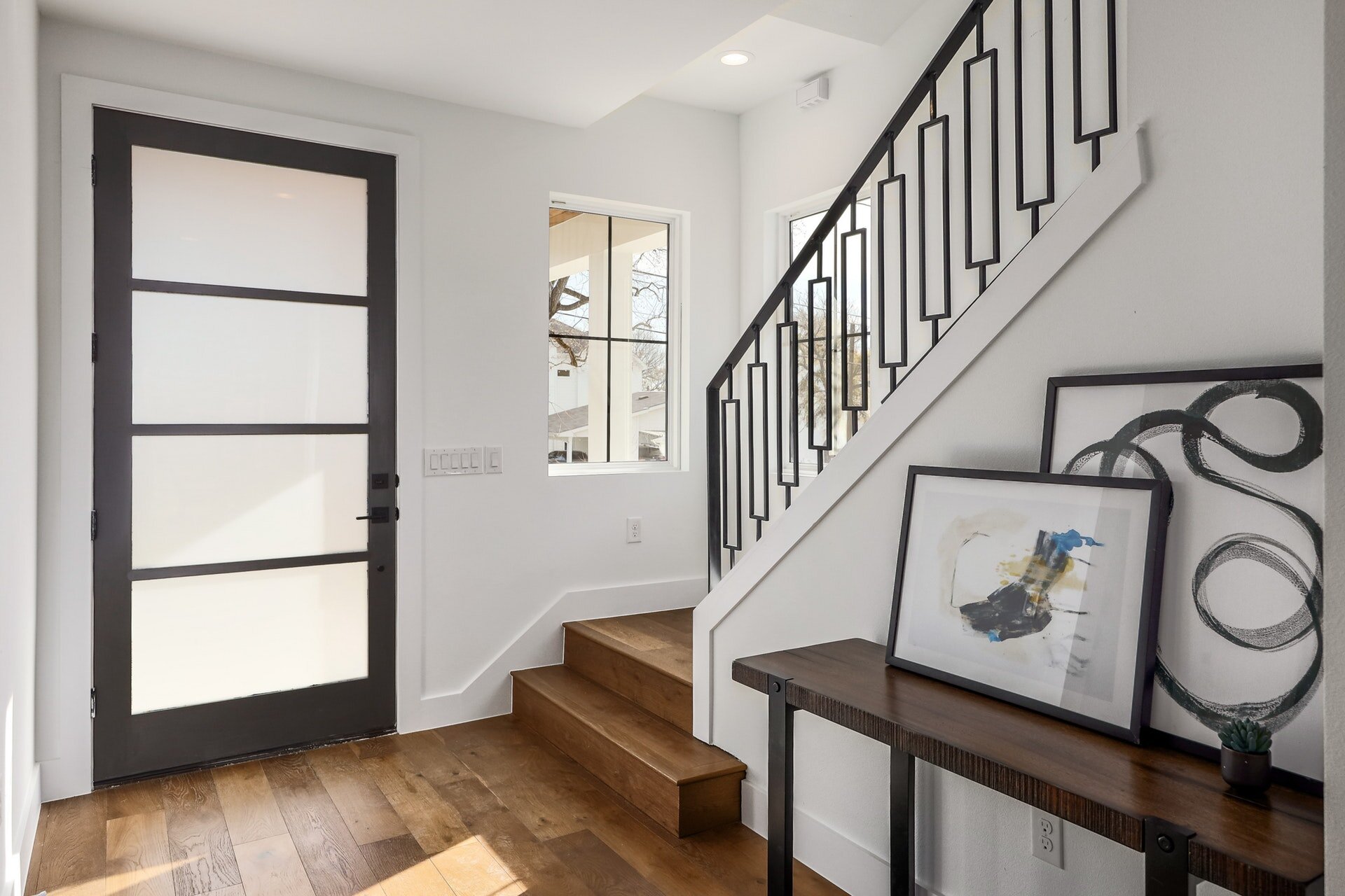 Entry way and stair way with stunning flooring