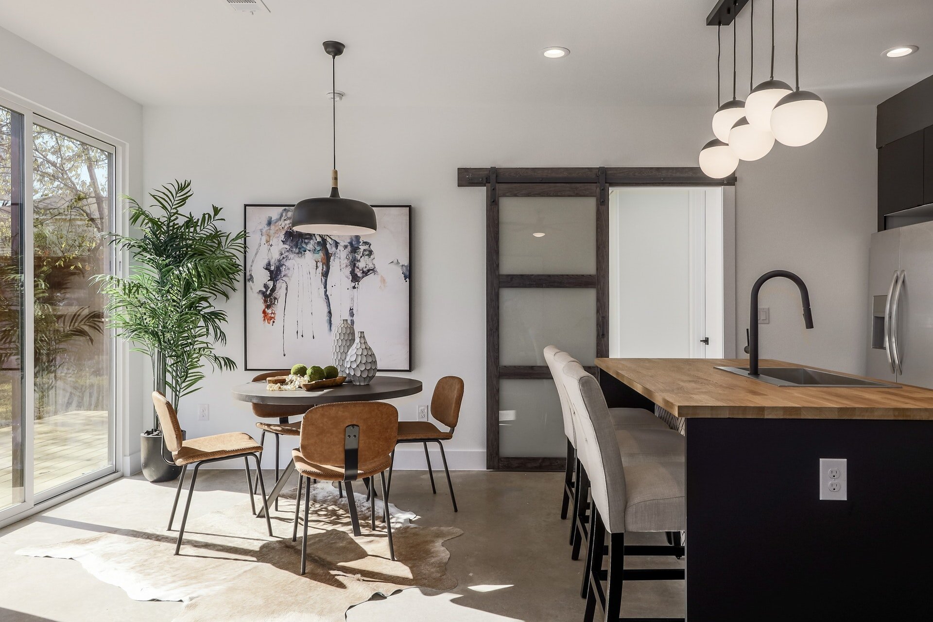 Kitchen and dining area with doors to back patio