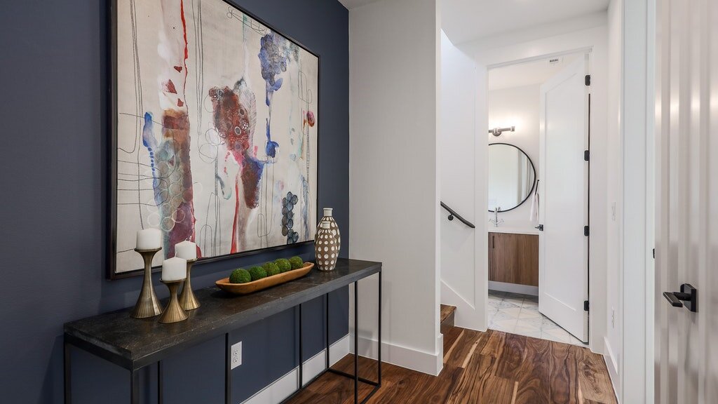 Hallway with a striking blue accent wall