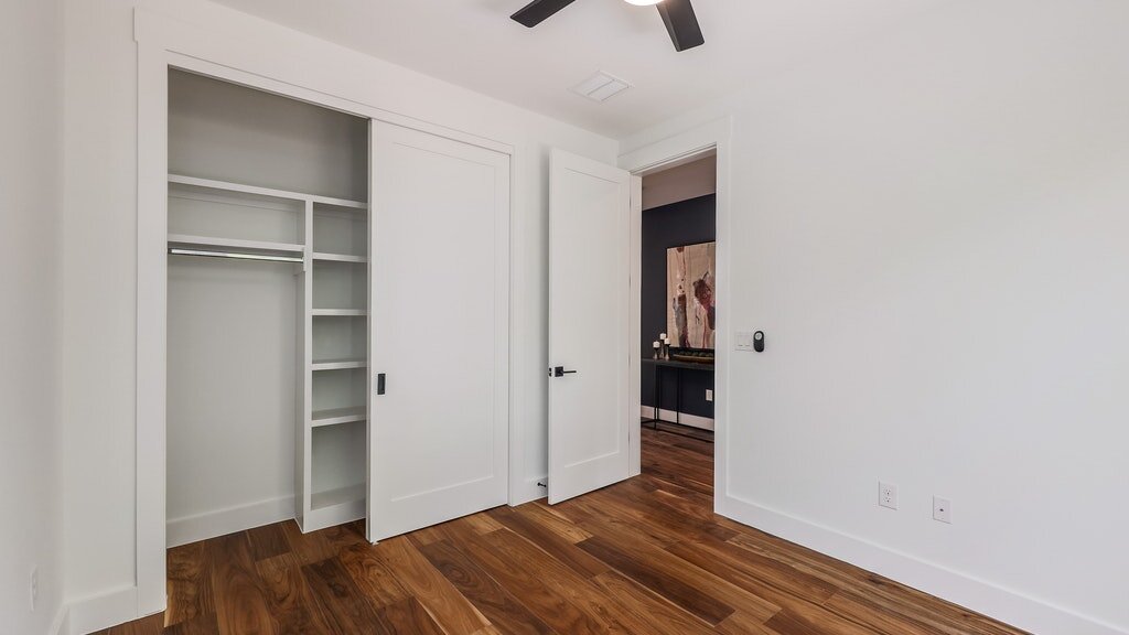 Bedroom with a sliding door closet