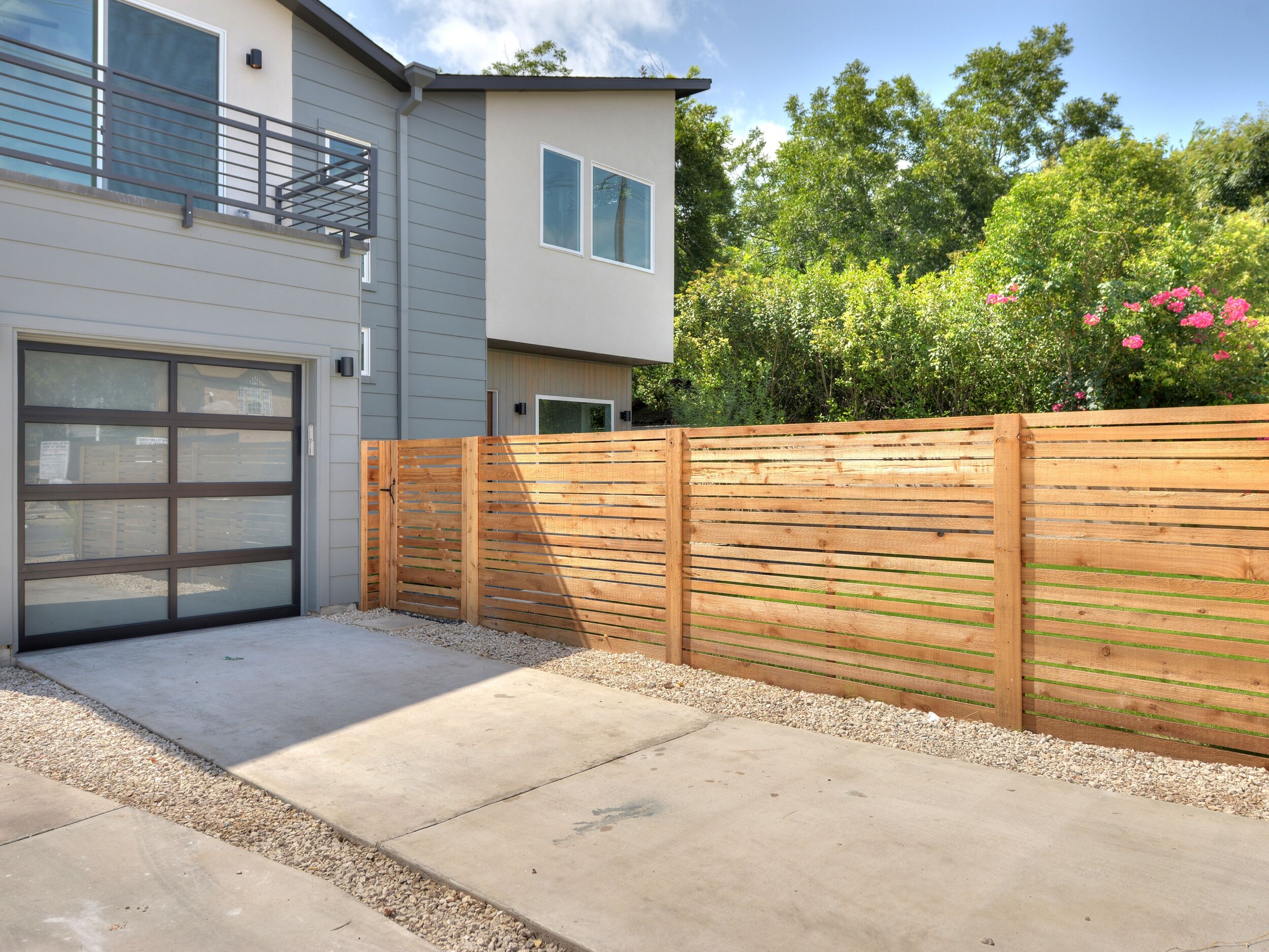 Driveway up to a unique garage