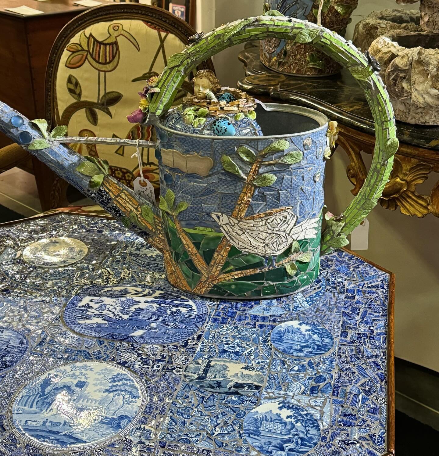 &ldquo;Pique&rdquo; is similar to mosaic using broken plates arranged in patterns and designs. These watering cans and furniture pieces are amazing!! 
I&rsquo;ll come back and tag the dealer shortly&hellip;