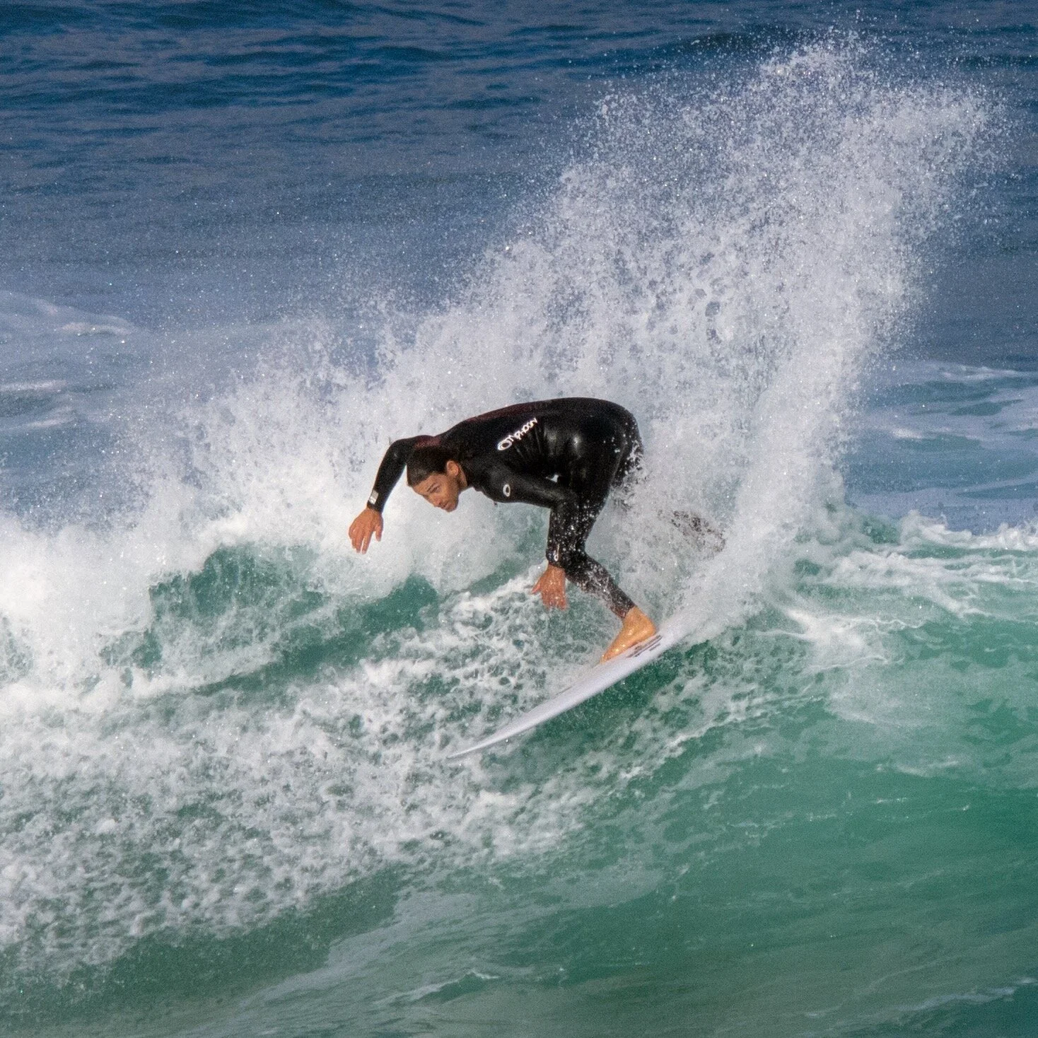 Alan Stokes surfing North Fistral, Newquay.