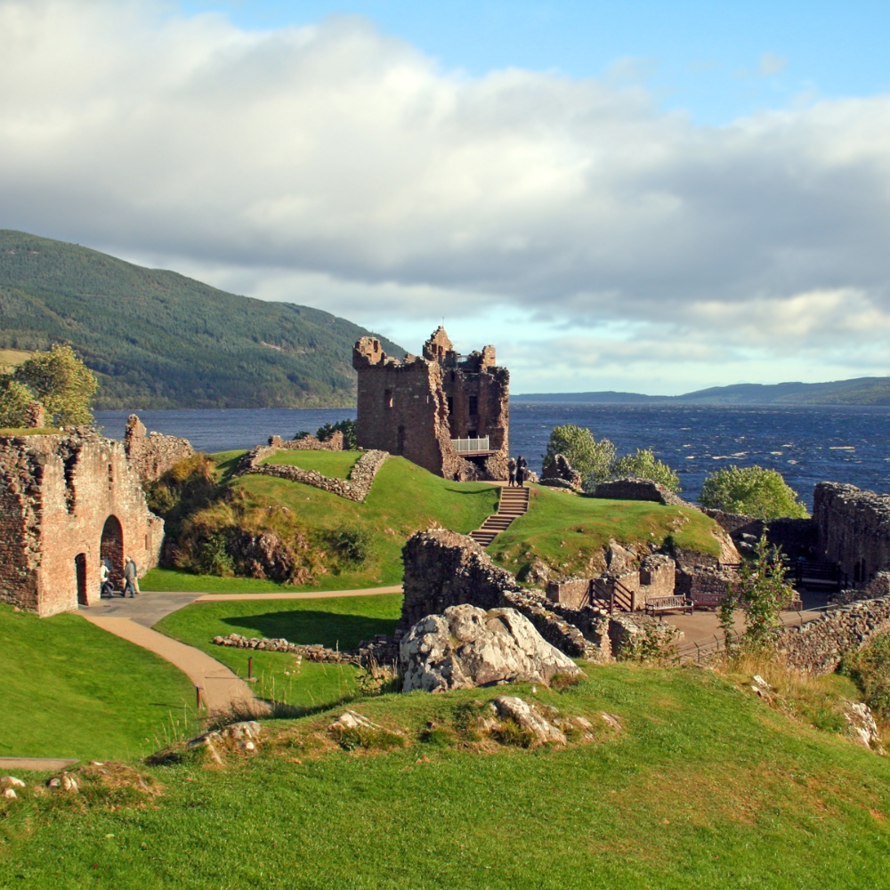 Castle overlooking the ocean on a Scotland road trip itinerary
