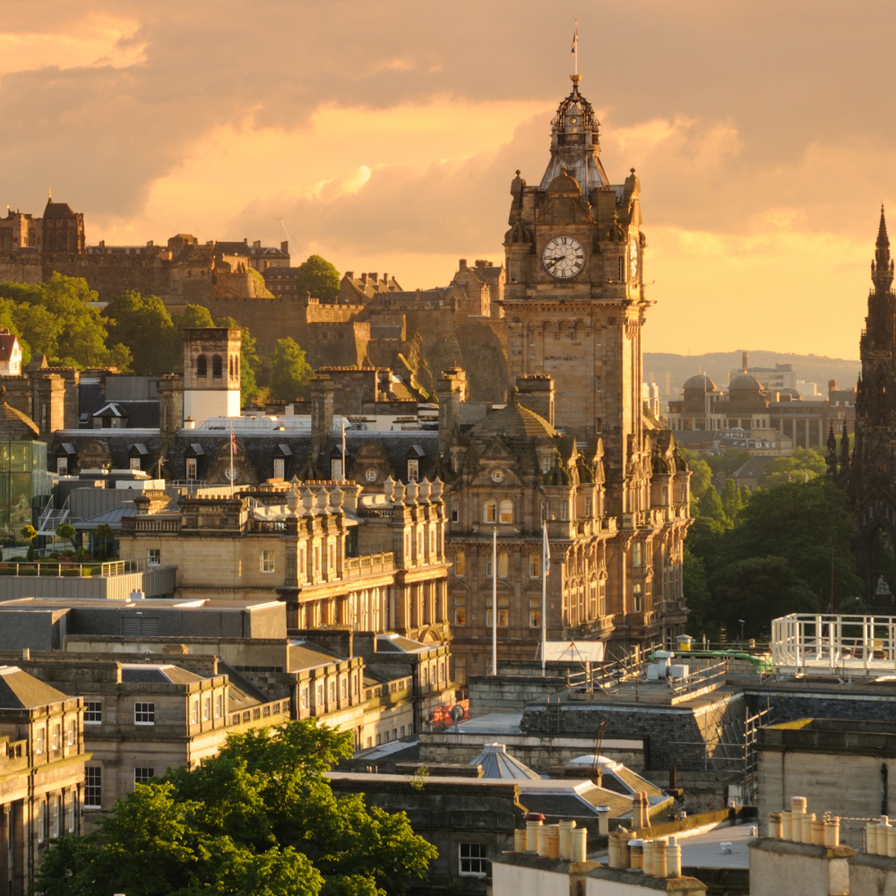 Panoramic view of Edinburgh city with historic buildings and castle on the horizon, Scotland