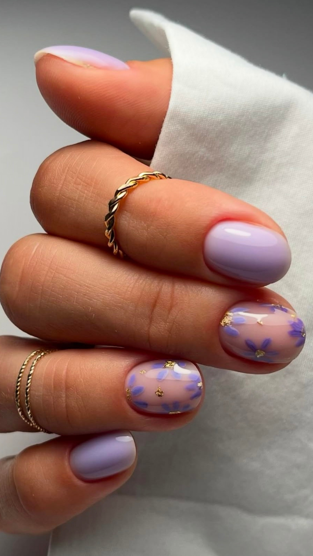 Lilac lavender spring nails with floral details