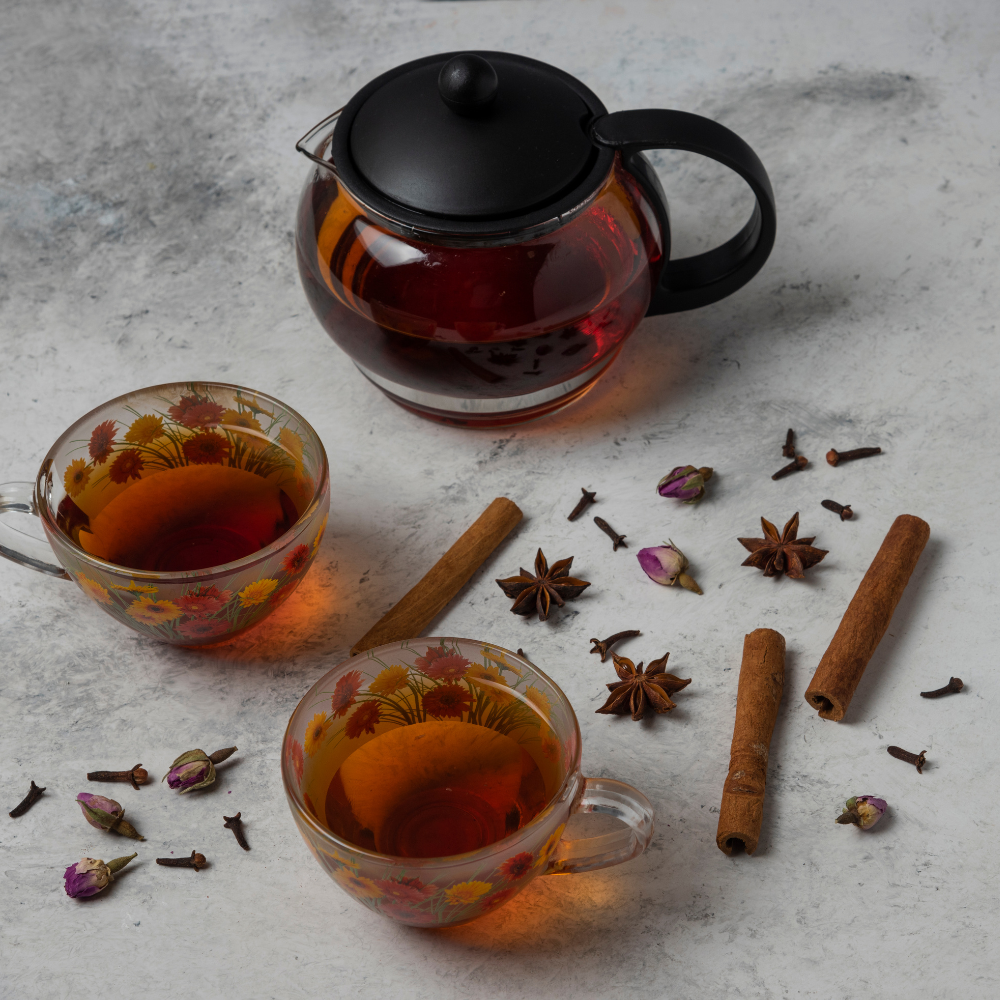 Warm brewed clove water in a glass cup, ready to drink for digestion and immunity