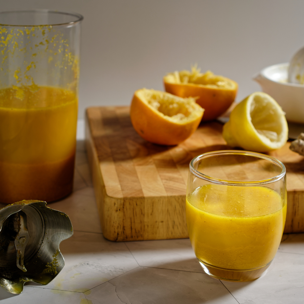Homemade ginger shots stored in small glass bottles in the refrigerator