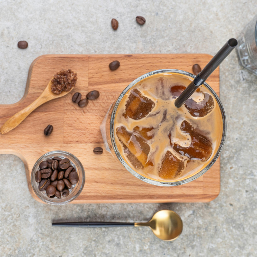 Easy homemade iced coffee in a glass with straw