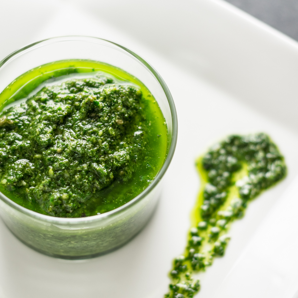 Easy, homemade kale pesto recipe blended with fresh kale, garlic, nuts, Parmesan cheese, olive oil, and lemon juice.