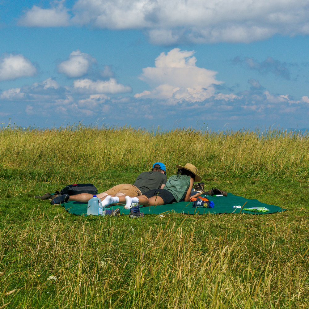 Romantic mountain picnic in Crested Butte with charcuterie board, wine, and scenic sunset views