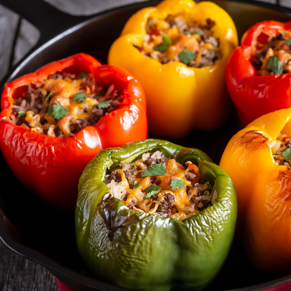 Old-fashioned stuffed bell peppers filled with seasoned ground beef, rice, and tomato sauce, baked until tender and topped with melty cheese