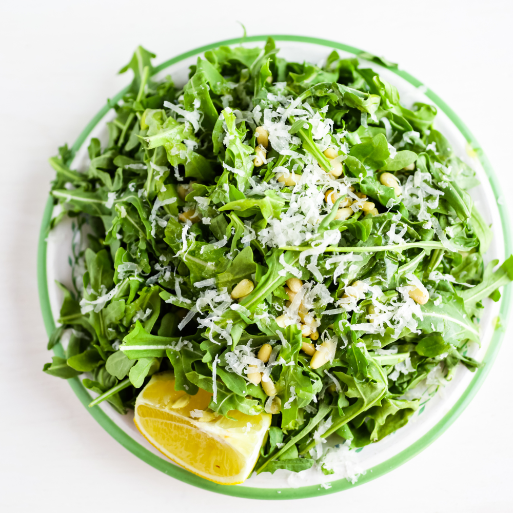 Fresh arugula salad with grated pecorino, tiny homemade croutons, and anchovy vinaigrette.