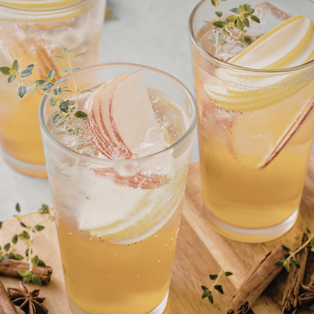 Apple leaf and mint herbal iced tea served chilled with honey.