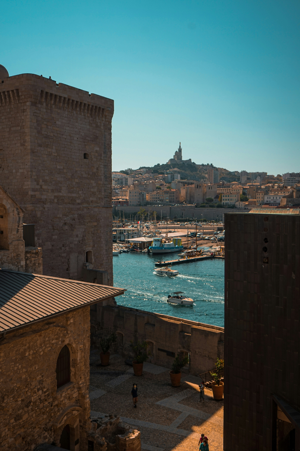 Historic Fort Saint-Jean and Tour du Fanal overlooking Marseille harbor in France